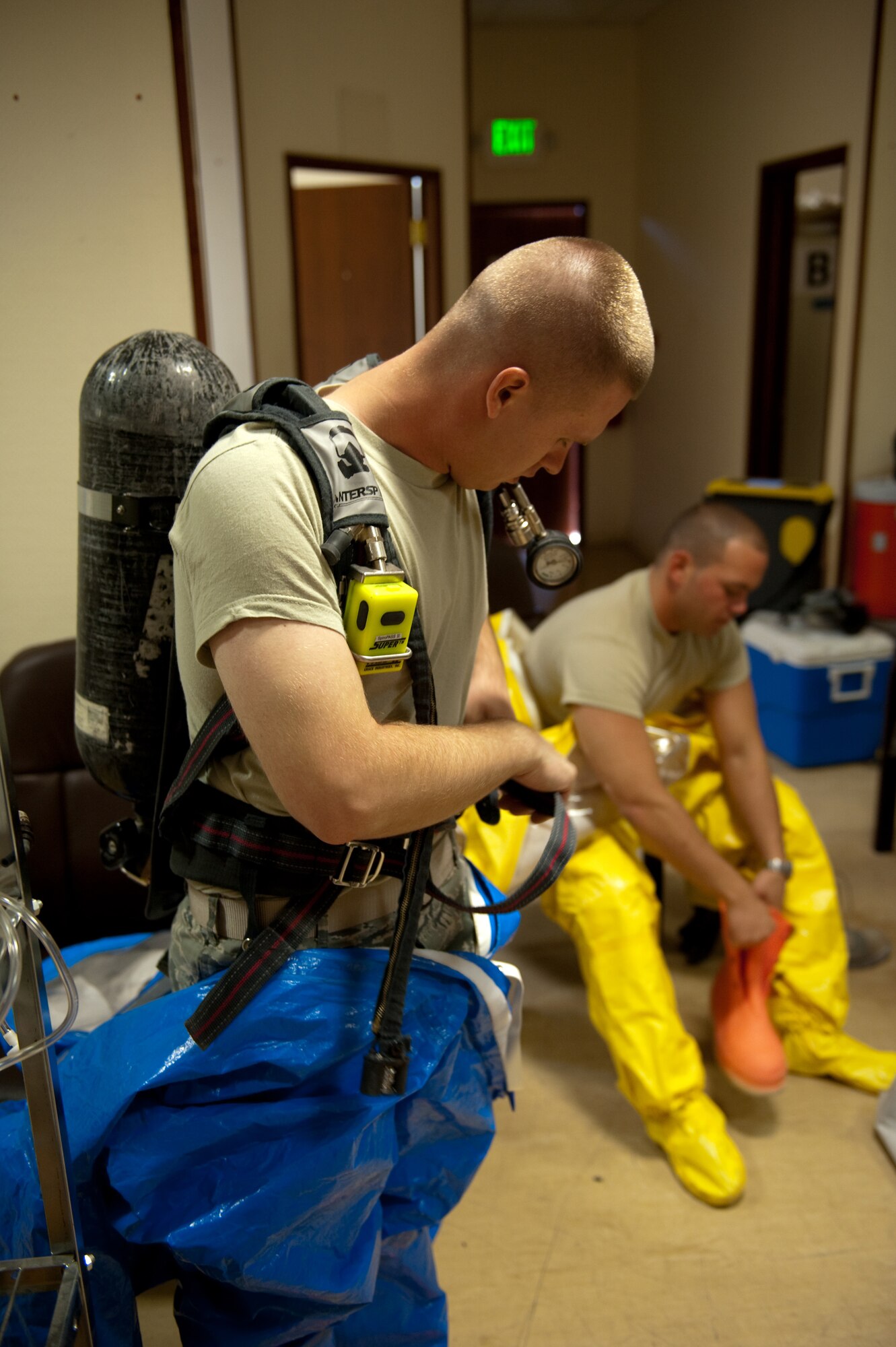 U.S. Air Force Tech. Sgt. Jeremy Roberts, 379th Expeditionary Medical Group Bioenvironmental Engineer technician, suits up in a level A Self- Contained Breathing Apparatus, Oct. 2, in Southwest Asia. 379 EMDG BEEs provide timely and accurate health risk assessments, CBRN response, and workplace safety. Sergeant Roberts is deployed from Wright-Patterson Air Force Base, Ohio, in support of Operations Iraqi and Enduring Freedom. (U.S. Air Force photo/Staff Sgt. Robert Barney/RELEASED) 