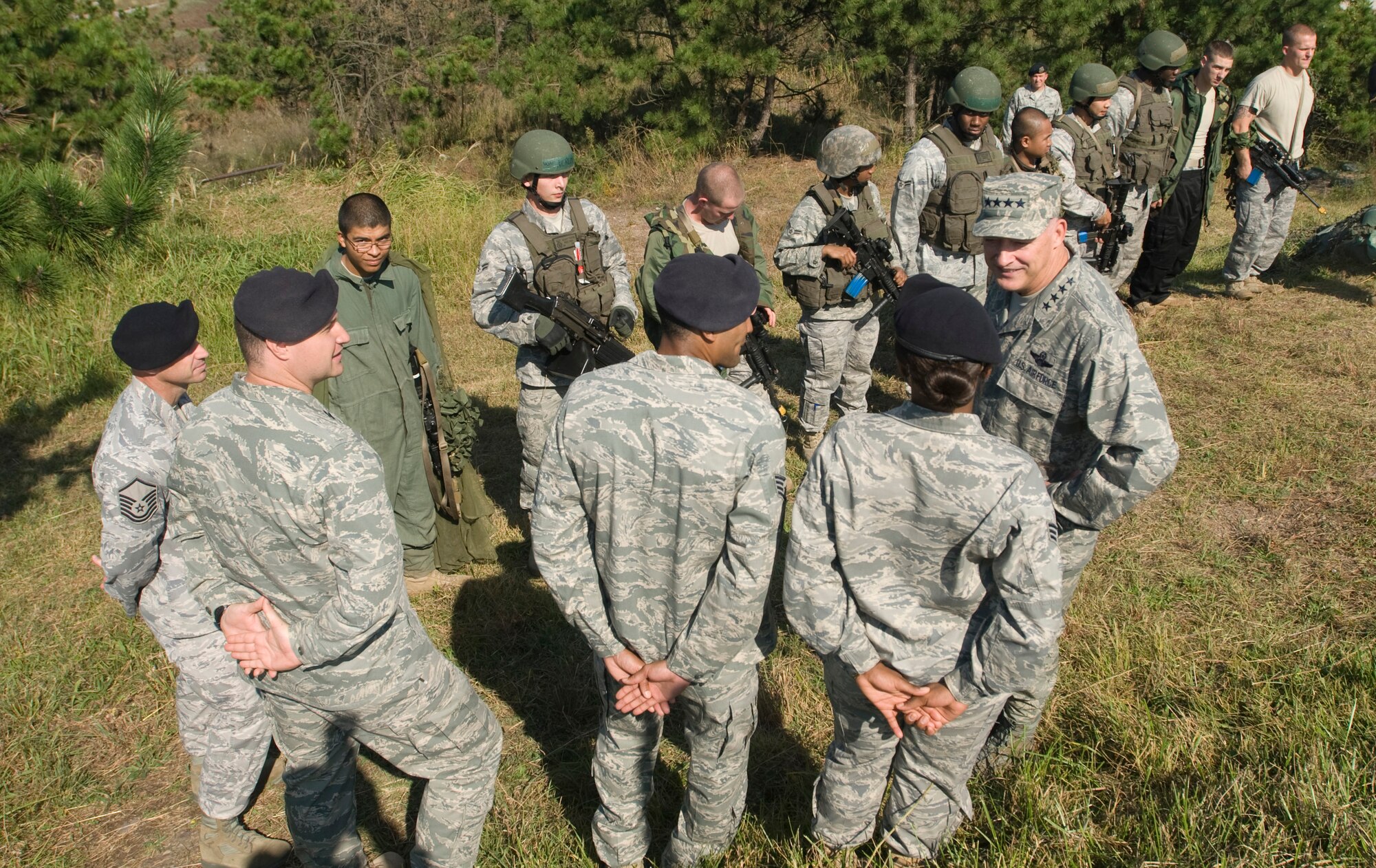 KUNSAN AIR BASE, Republic of Korea -- Gen. Gary North, Pacific Air Forces commander, talks to members of the 8th Security Forces Squadron about how they would defend the base Oct. 5. General North visited Kunsan for the first time as the PACAF commander. (U.S. Air Force photo \Senior Airman Jonathan Steffen)