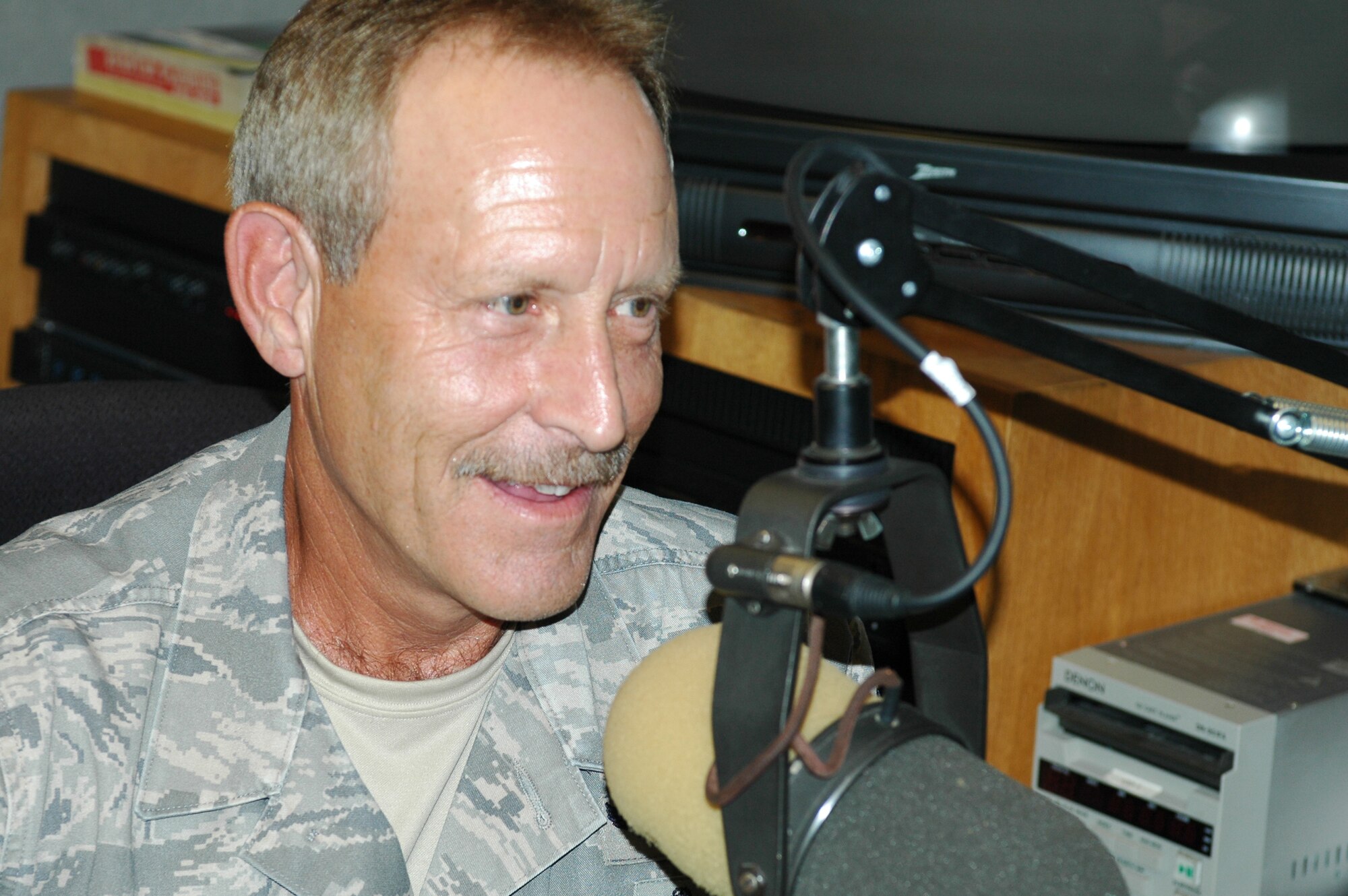 Senior Master Sgt. Hal Chandler records public service announcements for the Arizona Air National Guard’s 162nd Fighter Wing at Clear Channel Radio in Tucson, Sept. 22. Sergeant Chandler’s voice and acting ability helped the wing produce quality PSAs for public awareness and recruiting initiatives. (Air National Guard photo by Capt. Dan Dodson)