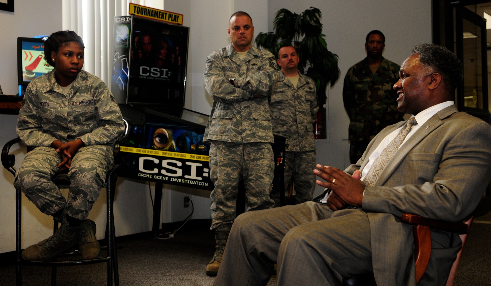 Horace Larry, Headquarters Air Force, sits down for a discussion with some of Bolling’s junior enlisted members Oct. 6 in the Blanchard Barracks day room at Bolling Air Force Base, D.C. Mr. Larry’s visit was spurred by the observance of the Year of the Air Force Family initiative set forth by Michael B. Donley, secretary of the Air Force, and Gen. Norton Schwartz, Air Force Chief of Staff. Mr. Larry was treated to a closer look at Bolling family-geared initiatives during his tour, when he visited the Airman and Family Readiness Center, Blanchard Barracks and 11th Services Division facilities, as well as members from the Airmen of Distinction, Key Spouses Program, Middle Tier Council and 11th Chiefs’ Group. (U.S. Air Force photo by Airman 1st Class Susan Moreno)