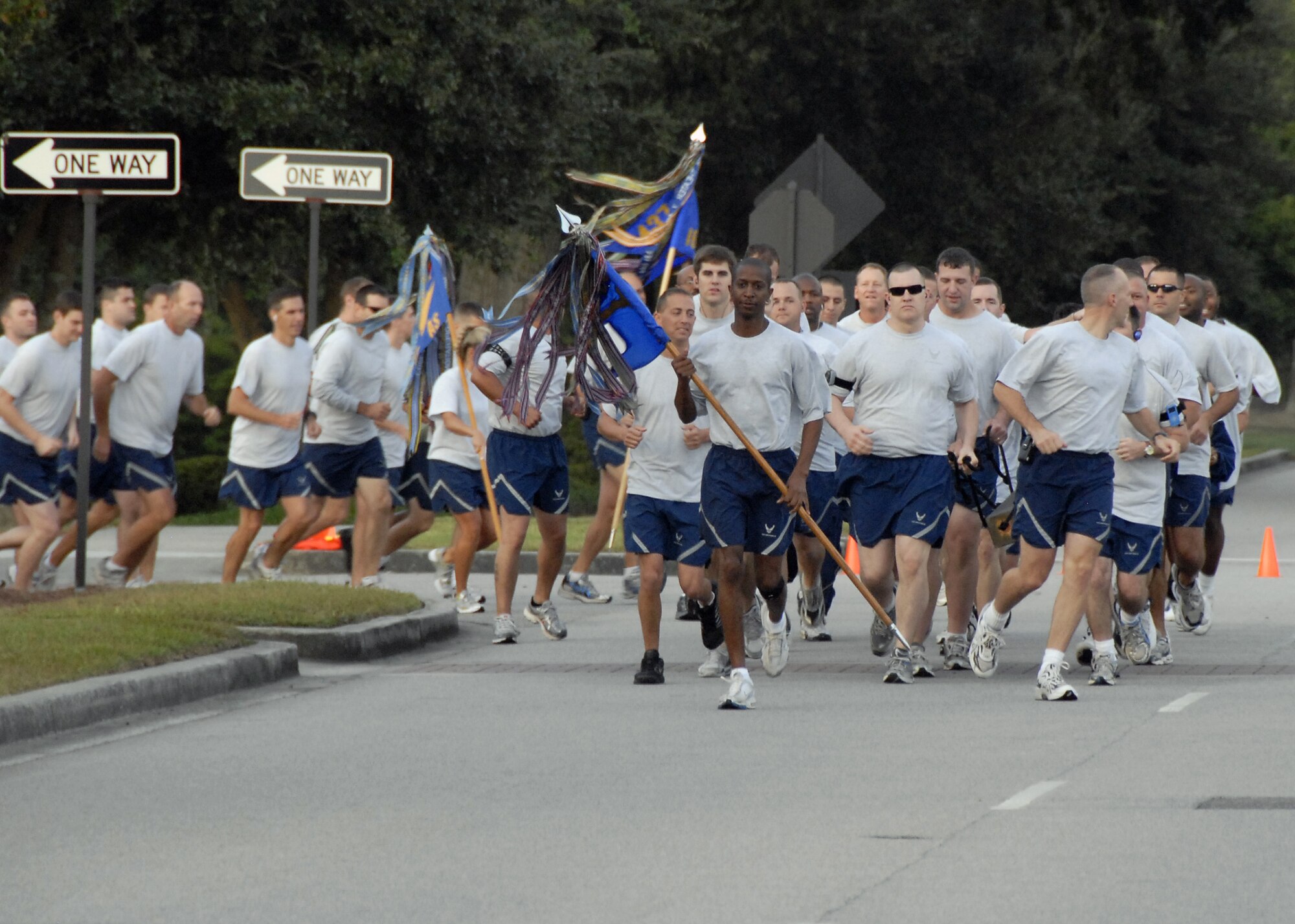 Members of the 437th Security Forces Squadron take the lead at the start of the Commander's Fitness Challenge 5K run on Hill Boulevard here Oct. 2. The fitness challenge was hosted by the 437th Operations Group. (U.S. Air Force photo/Staff Sgt. Daniel Bowles)