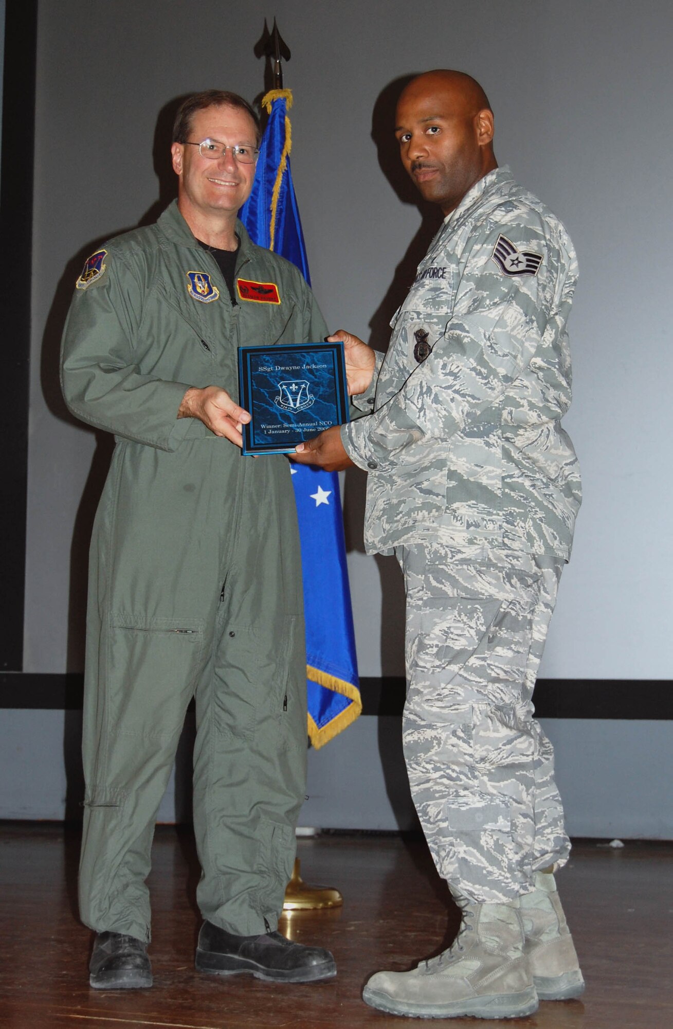 (Right) Tech. Sgt. Dwayne Jackson, 926th Force Support Squadron, is recognized Oct. 3 as the NCO of the Half. (U.S. Air Force Reserve photo by Capt. Jessica Martin)
