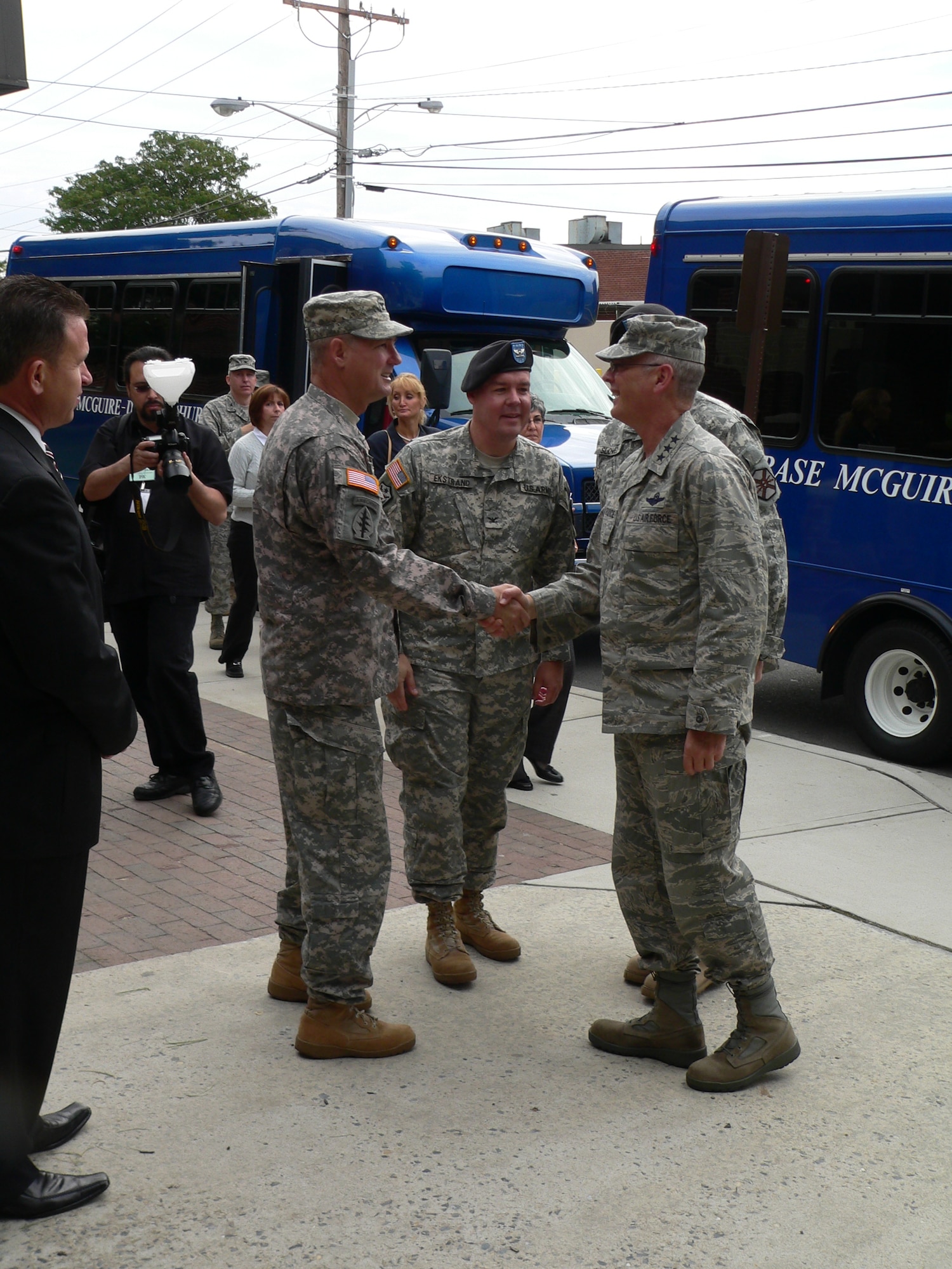 Col. John Eckstrand, Walson Support Medical Element commander, and Col. Timothy Williams, 72nd Field Artillary Brigade commander, greet Lt. Gen. Robert Allardice, 18th Air Force and U.S. Air Force Transportation commander, during his visit to the Joint Readiness Center on Dix Oct 2. here. (U.S. Air Force photo/Steve Snyder)
