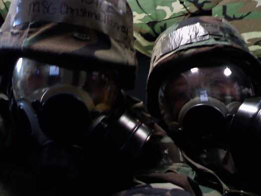 Master Sgt. Christina Harvey, unit training manager, and Tech Sgt. Sabrina Wiggett, formal schools manager, both of the newly formed 103rd Force Support Squadron, seize the moment for a photo-op during the August 2009 Operational Readiness Exercise at Bradley Air National Guard Base, East Granby, Conn.  The two used their respective pre-merger backgrounds (services and military personnel flights) to assist each other in FSS duties, i.e. processing casualty reports and performing additional PERSCO duties.  (Photo courtesy of Master Sgt. Christina Harvey)
