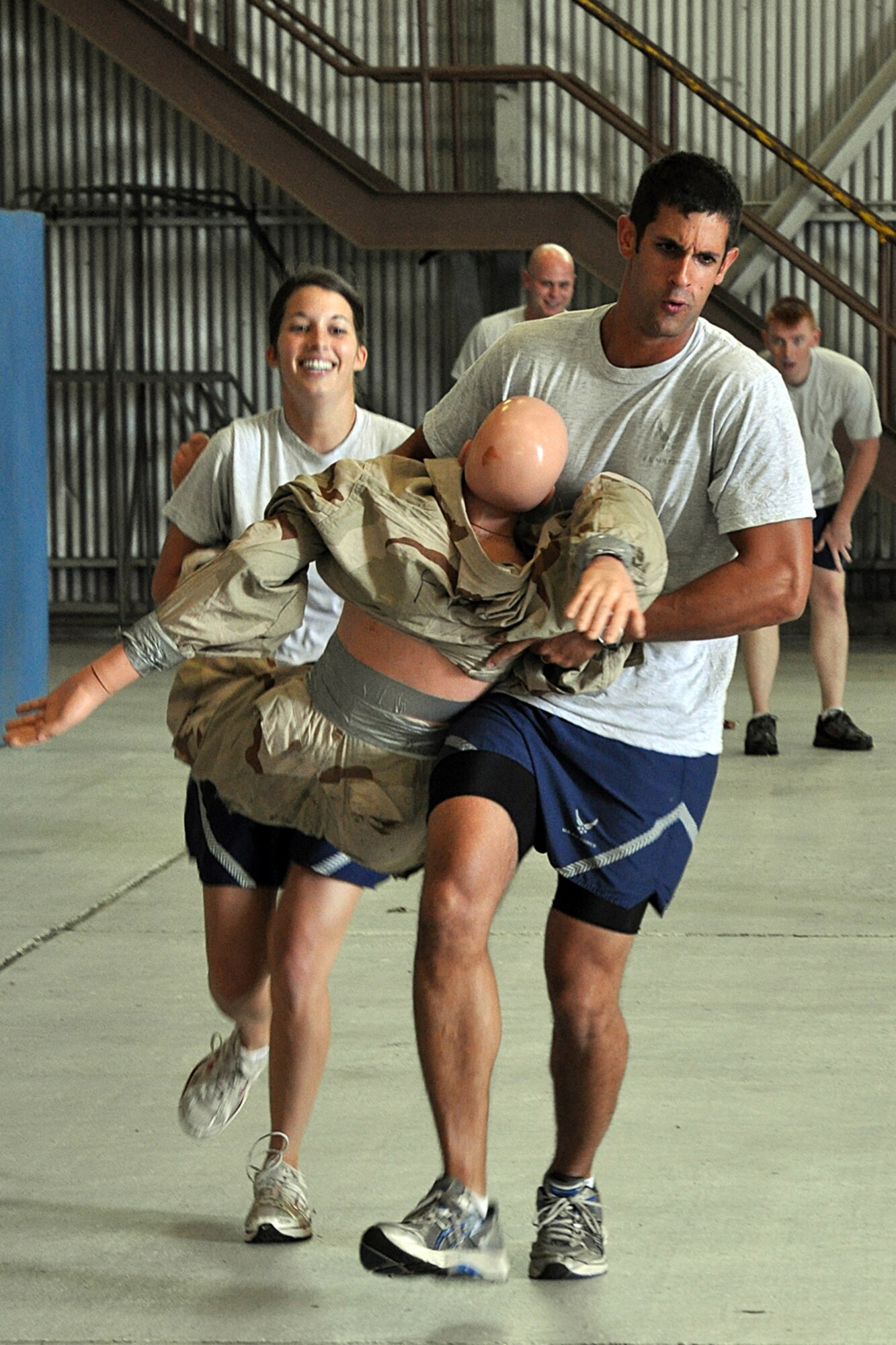 EGLIN AIR FORCE BASE, Fla. – Airmen compete in a two-man victim carry during the Annual Fire Muster Challenge, Oct. 5. The event gave Airmen a chance to have fun while gaining an appreciation for the firefighter experiences. The Commanders vs. First Sergeants Challenge and the Commander’s Challenge, hosted the same day, kicked off Fire Prevention Week. (U.S. Air Force photo/ Airman Anthony Jennings)