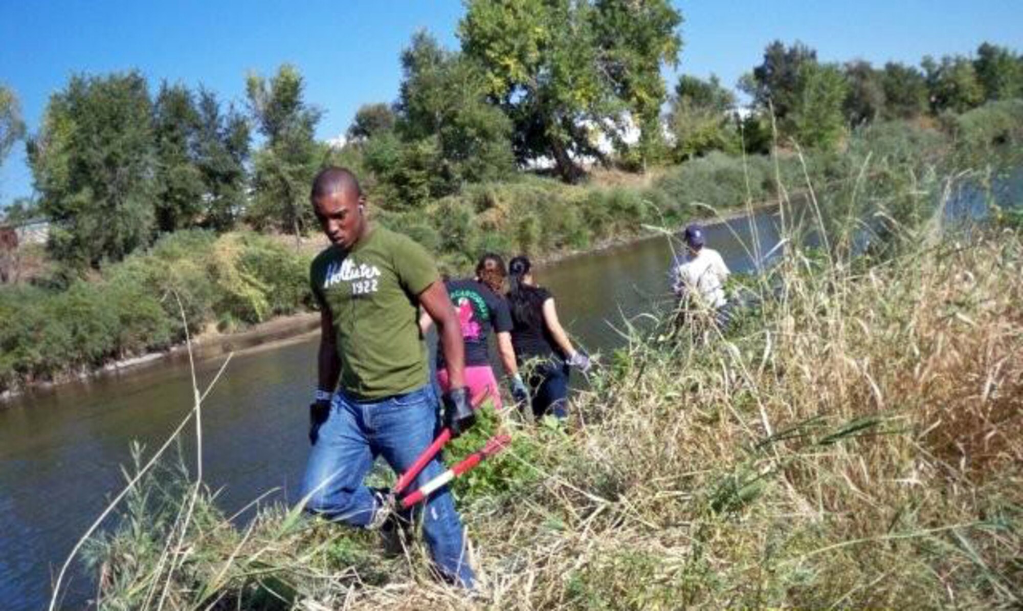 Denver, Colo. - Around 20 Team Buckley members volunteered more than 5 hours
during the 17th annual "River Sweep" Sep. 26. Volunteers picked up trash,
painted and cleared brush along the Platte River in Denver. (U.S. Air Force
photo by Dakotah Cross)