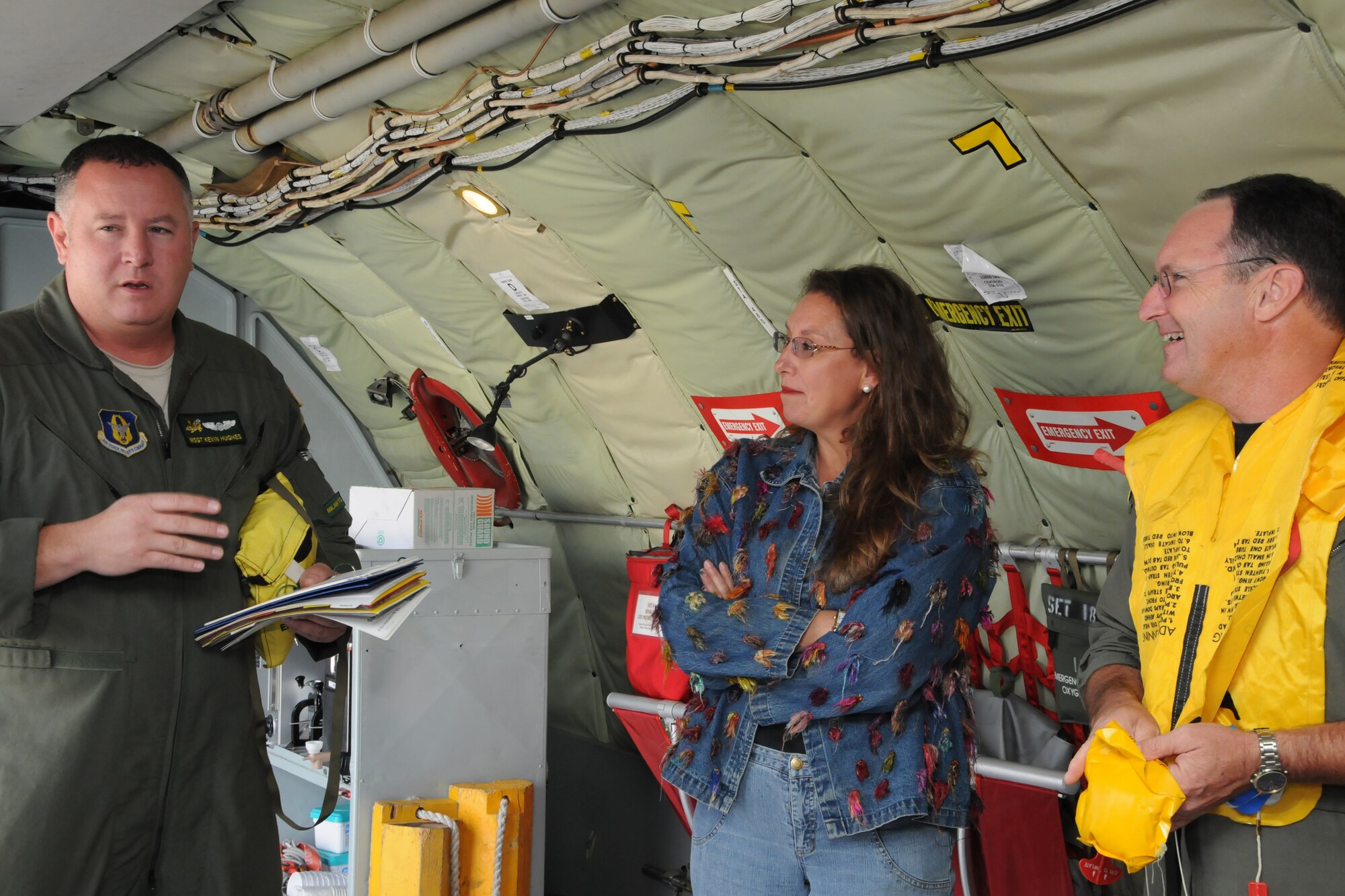 SEYMOUR JOHNSON AIR FORCE BASE, N.C. -- Master Sgt. Kevin Hughes, 77th Air Refueling Squadron, gives a safety brief to the spouses participating in the Spouses Orientation Flight on Sunday of the October Unit Training Assembly.  (U.S. Air Force Photo by Tech. Sgt. Gillian M. Albro)