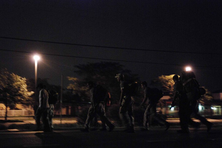 U. S. Air Force combat controllers gather for a relay march of more than 800 miles from Lackland Air Force Base, Texas to Hurlburt Field, Florida. The march is in memory of 12 special tactics Airmen who died in combat in Iraq and Afghanistan. The march starts at Lackland where combat controller training starts. It ends 10 days and five states later at Hurlburt Field where Airmen become combat controllers. The formation leaves the Lackland Training Annex, Lackland, led by Mark Espinosa, combat controler who was wounded in Afghanistan. (U.S. Air Force photo/Airman 1st Class Brian McGloin) 