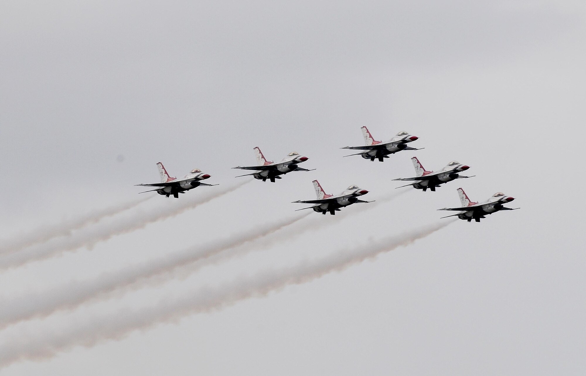 ANDERSEN AIR FORCE BASE, Guam - U.S. Air ForceThunderbird F-16s fly in trail formation here Oct. 6. The air show is a free even open to the public. Andersen's main gate will open at noon and close at 5 p.m. (U.S. Air Force photo by Senior Airman Nichelle Anderson)