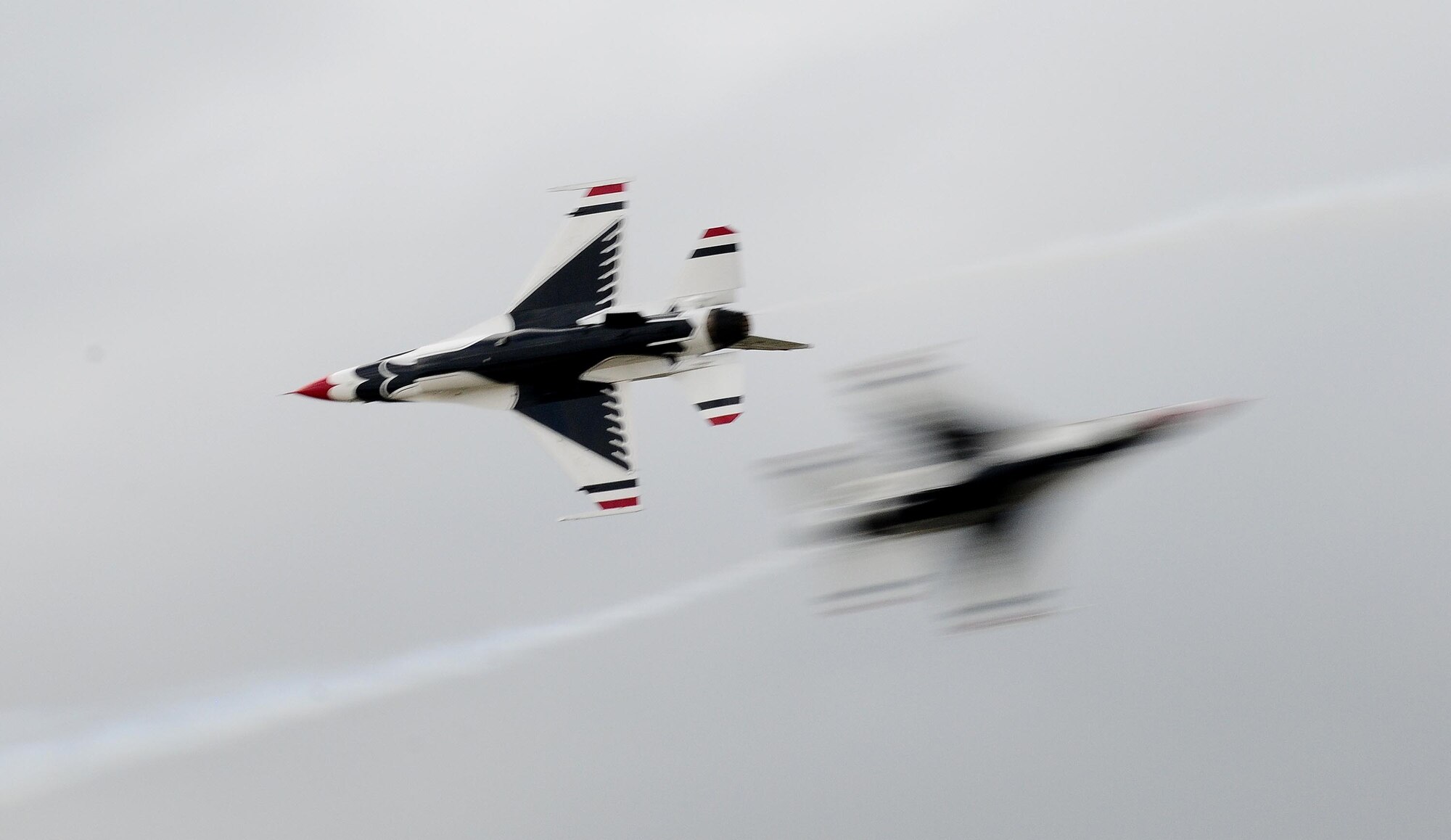 ANDERSEN AIR FORCE BASE, Guam - U.S. Air ForceThunderbird F-16s fly in trail formation here Oct. 6. The air show is a free even open to the public. Andersen's main gate will open at noon and close at 5 p.m. (U.S. Air Force photo by Senior Airman Nichelle Anderson)