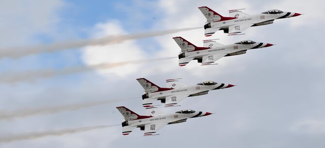 ANDERSEN AIR FORCE BASE, Guam - U.S. Air ForceThunderbird F-16s fly in trail formation here Oct. 6. The air show is a free even open to the public. Andersen's main gate will open at noon and close at 5 p.m. (U.S. Air Force photo by Senior Airman Nichelle Anderson)