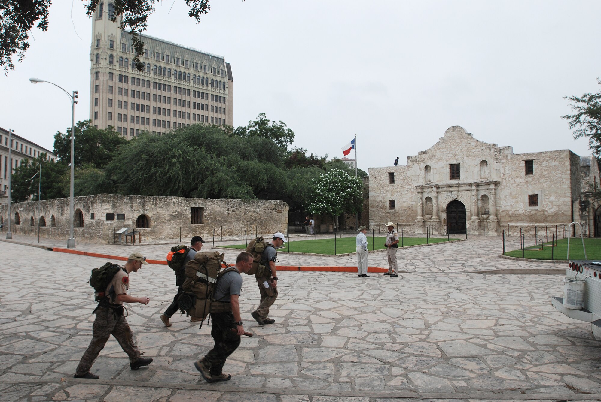 U.S. Air Force combat controllers march more than 800 miles from Lackland Air Force Base, Texas to Hurlburt Field, Florida, passing through downtown San Antonio. The march is in memory of 12 special tactics Airmen who died in combat in Iraq and Afghanistan. The march starts at Lackland where combat controller training starts. It ends 10 days and five states later at Hurlburt Field where Airmen become combat controllers. (U.S. Air Force photo/Airman 1st Class Brian McGloin) 