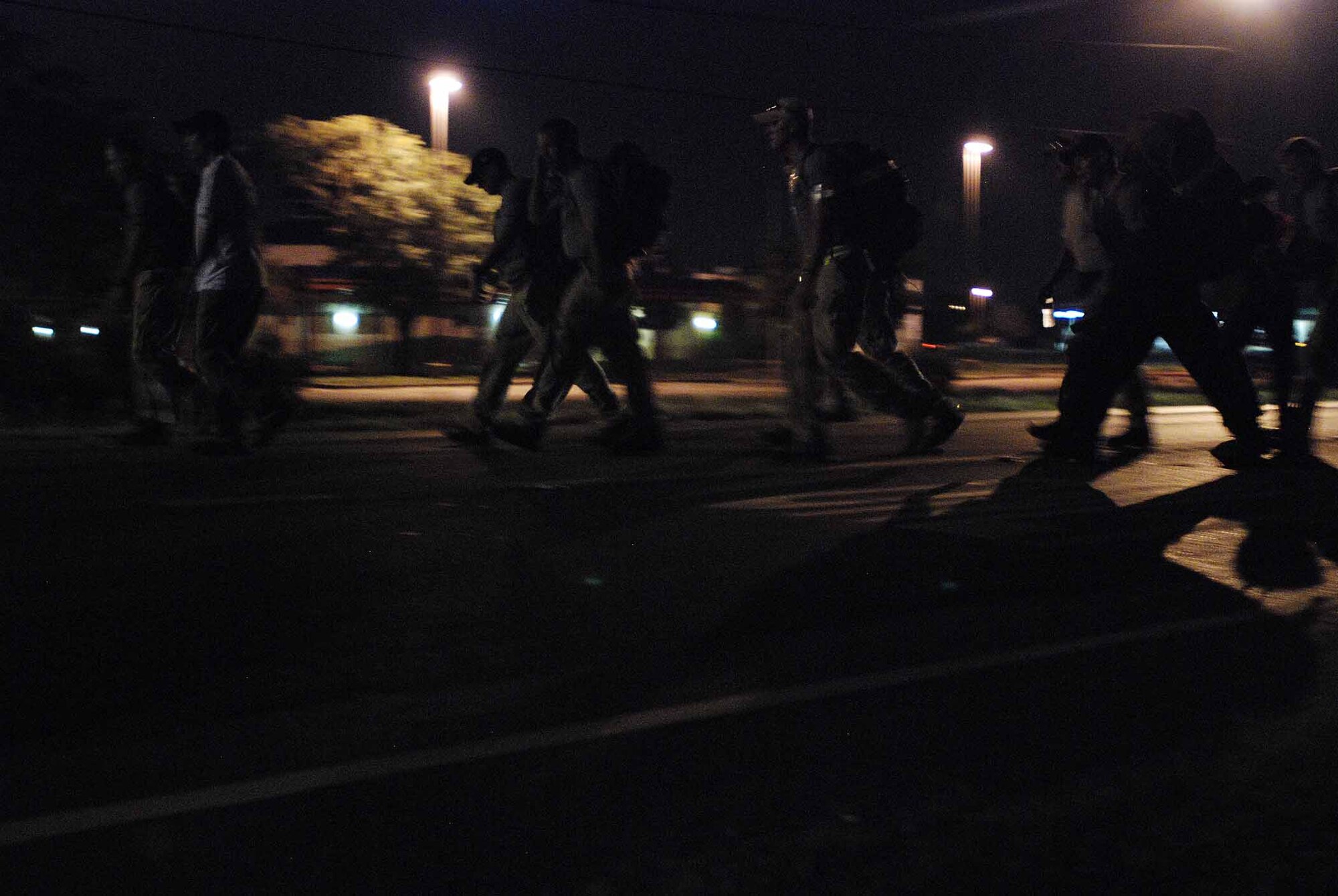 U. S. Air Force combat controllers gather for a relay march of more than 800 miles from Lackland Air Force Base, Texas to Hurlburt Field, Florida. The march is in memory of 12 special tactics Airmen who died in combat in Iraq and Afghanistan. The march starts at Lackland where combat controller training starts. It ends 10 days and five states later at Hurlburt Field where Airmen become combat controllers. The formation leaves the Lackland Training Annex, Lackland, led by Mark Espinosa, combat controler who was wounded in Afghanistan. (U.S. Air Force photo/Airman 1st Class Brian McGloin) 