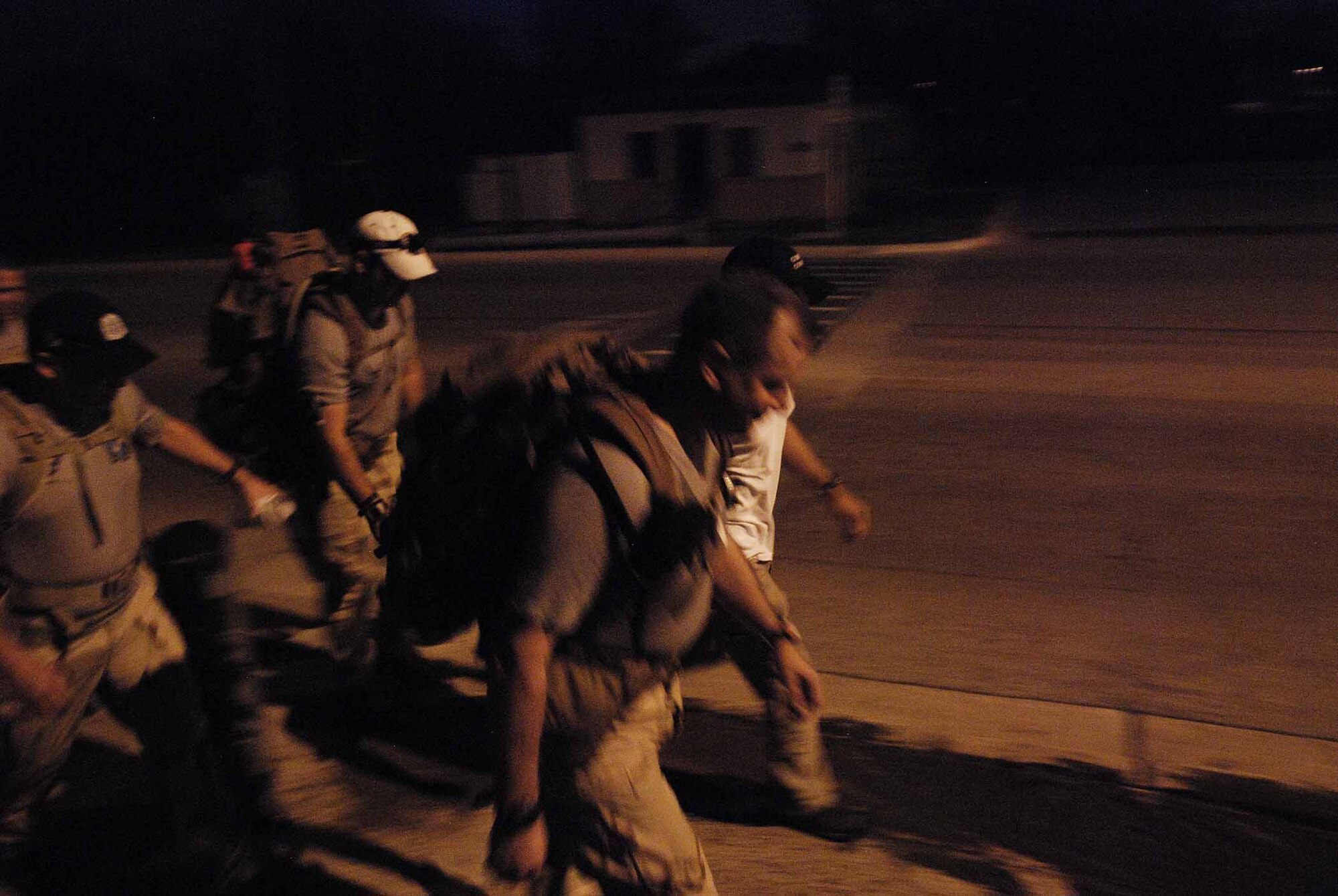 U. S. Air Force combat controllers gather for a relay march of more than 800 miles from Lackland Air Force Base, Texas to Hurlburt Field, Florida. The march is in memory of 12 special tactics Airmen who died in combat in Iraq and Afghanistan. The march starts at Lackland where combat controller training starts. It ends 10 days and five states later at Hurlburt Field where Airmen become combat controllers. The formation leaves the Lackland Training Annex, Lackland, led by Mark Espinosa, combat controler who was wounded in Afghanistan. (U.S. Air Force photo/Airman 1st Class Brian McGloin) 