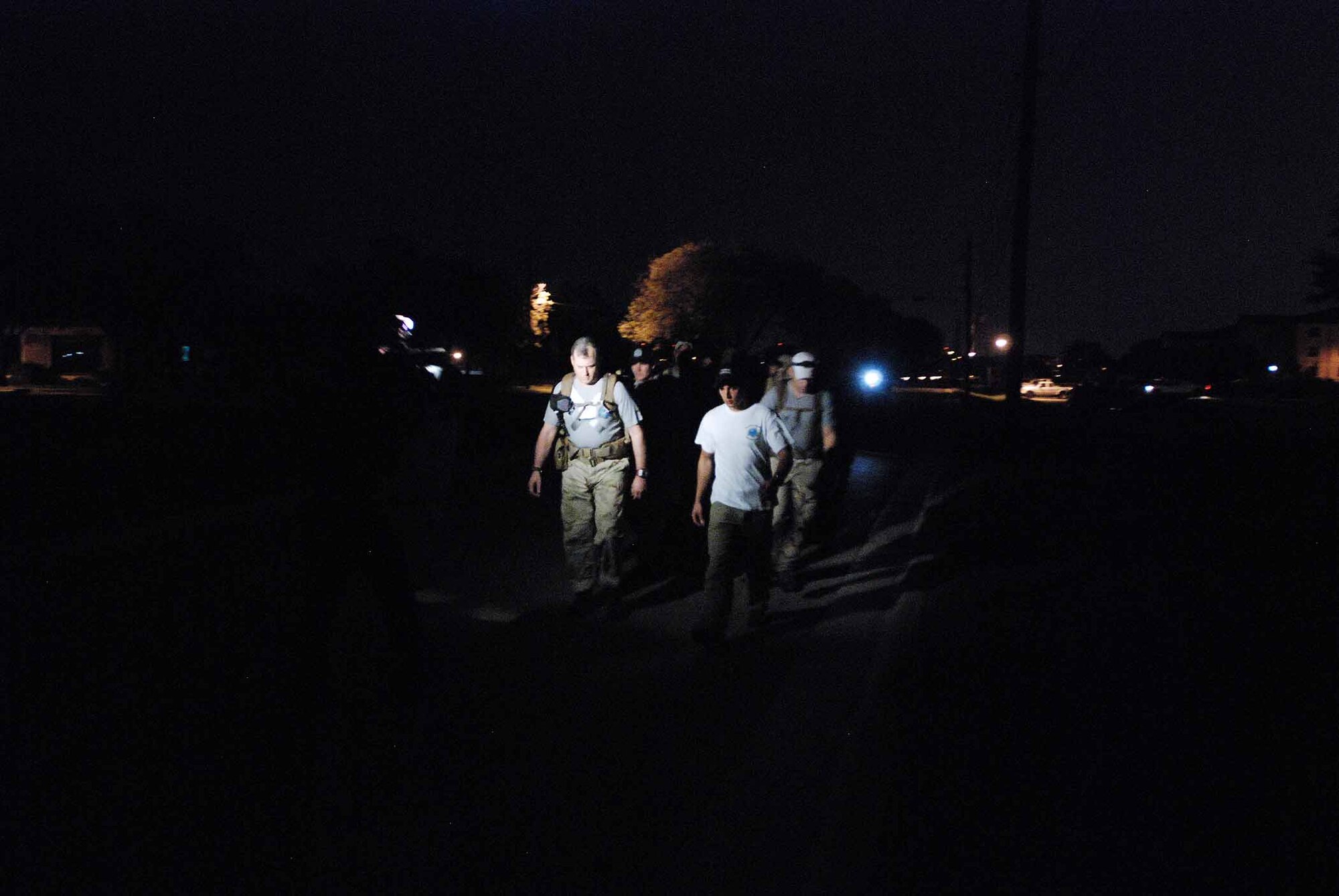 U. S. Air Force combat controllers gather for a relay march of more than 800 miles from Lackland Air Force Base, Texas to Hurlburt Field, Florida. The march is in memory of 12 special tactics Airmen who died in combat in Iraq and Afghanistan. The march starts at Lackland where combat controller training starts. It ends 10 days and five states later at Hurlburt Field where Airmen become combat controllers. The formation leaves the Lackland Training Annex, Lackland, led by Mark Espinosa, combat controler who was wounded in Afghanistan. (U.S. Air Force photo/Airman 1st Class Brian McGloin) 