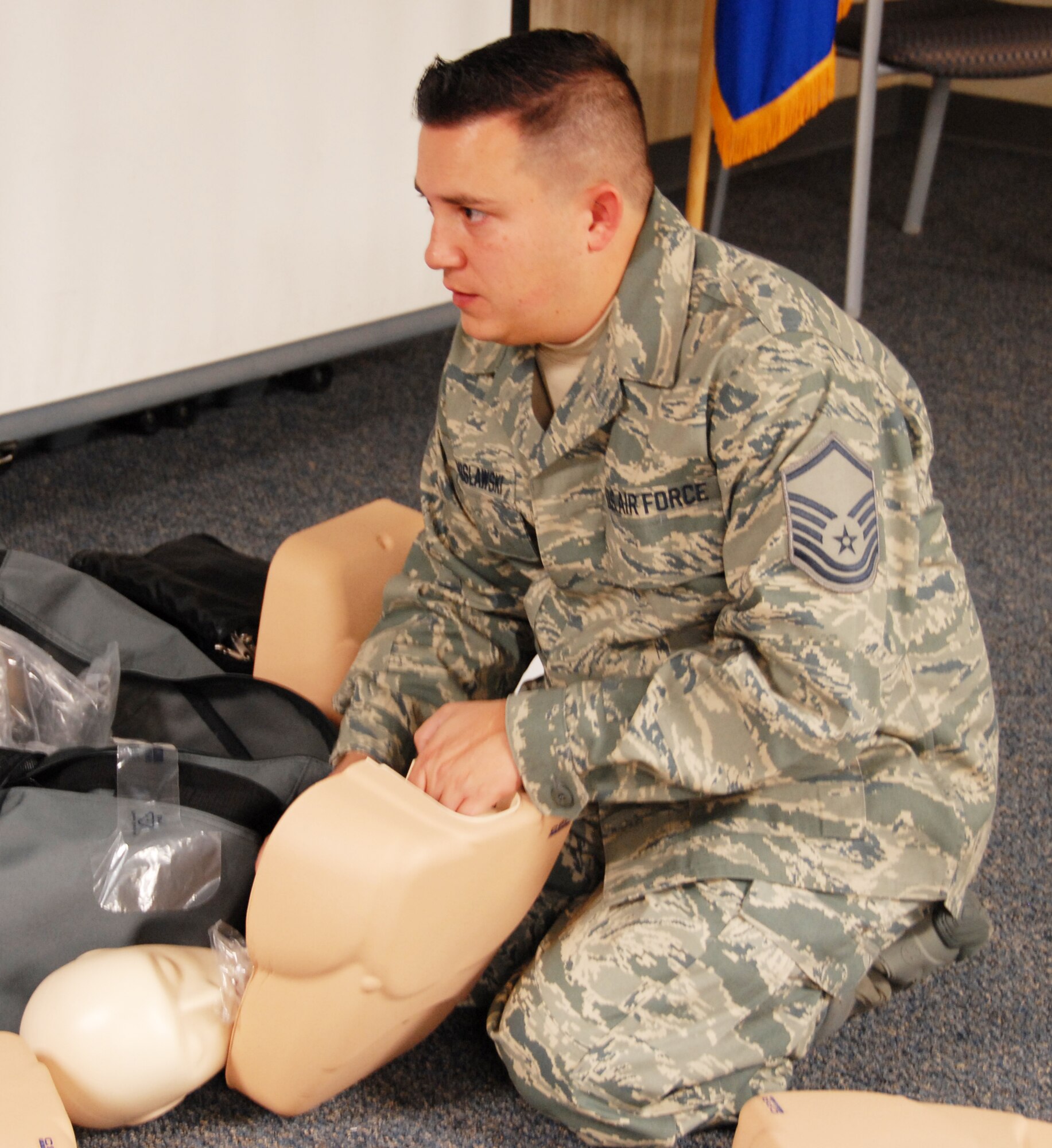 A member of the 477th Fighter Group Aeromedical Flight prepares a CPR dummy prior to annual training for group Reserve members during their October drill weekend. Drill weekends provide an opportunity for Reservists to hone their skills,  including life-saving CPR, to prepare for Air Force missions around the world.  (Air Force Photo/Maj. Cary McPartlin)