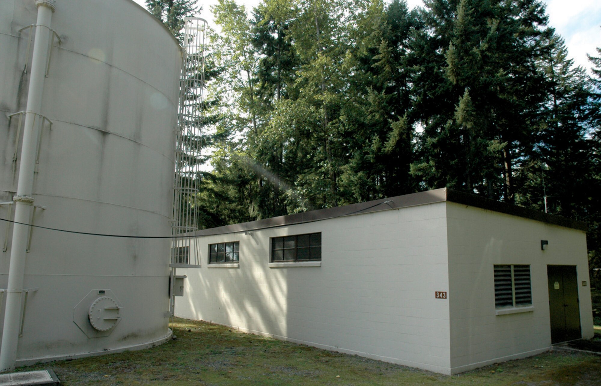 MCCHORD AIR FORCE BASE, Wash., - A water control substation was the focus of Reserve civil engineer Airmen during their annual tour here.  The Reservists, in just five days, worked a fire protection system overhau. Reserve Airmen from the 446th Civil Engineer Squadron retrofitted the decades-old building with an extensive list of modern fire protection equipment, including installation of approximately 400 feet of conduit piping, 800 feet of electrical wire, 15 tamper control modules, three smoke detectors, two fire alarm pull stations with horn strobes and a fire alarm control panel. 