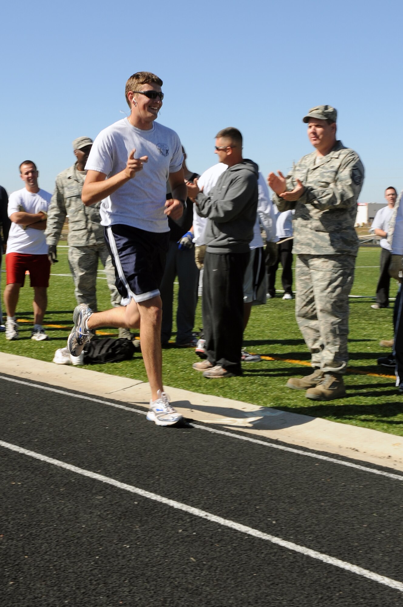 Buckley Air Force Base, Colo. – Brian Powell, 460th Contracting Squadron, crosses the finish line in 1st place in the 5K run during Buckley’s Sports and Field Day Oct. 2. (U. S. Air Force photo by Senior Airman John Easterling)