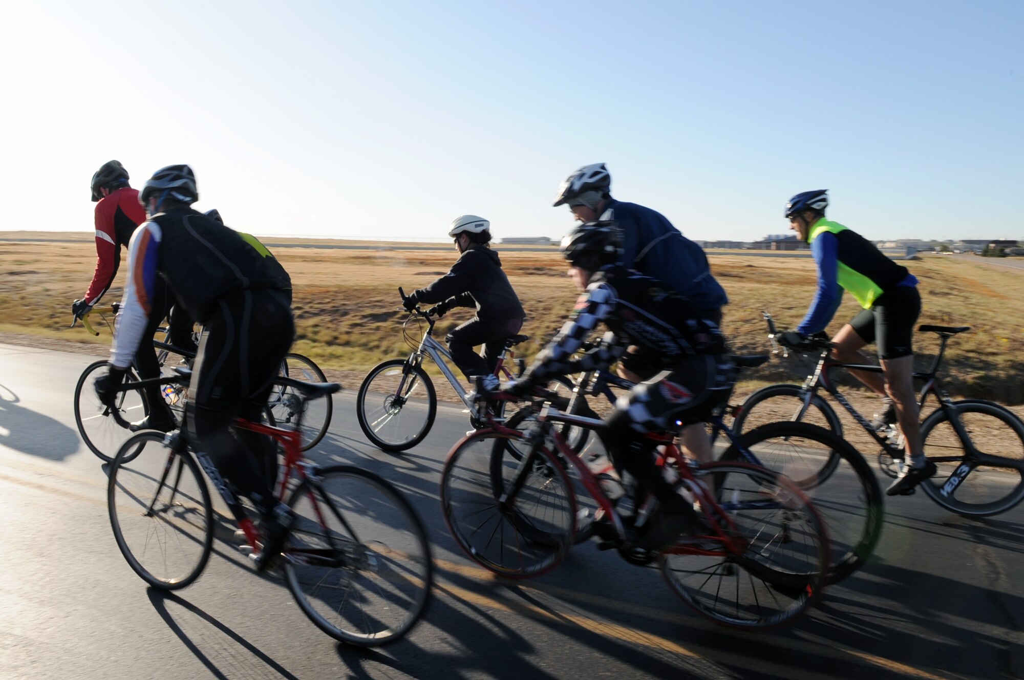 Buckley Air Force Base, Colo. – Around 18 Team Buckley members take off at the start of the 10k bike race during Buckley’s Sports and Field Day Oct. 2. (U. S. Air Force photo by Senior Airman John Easterling)