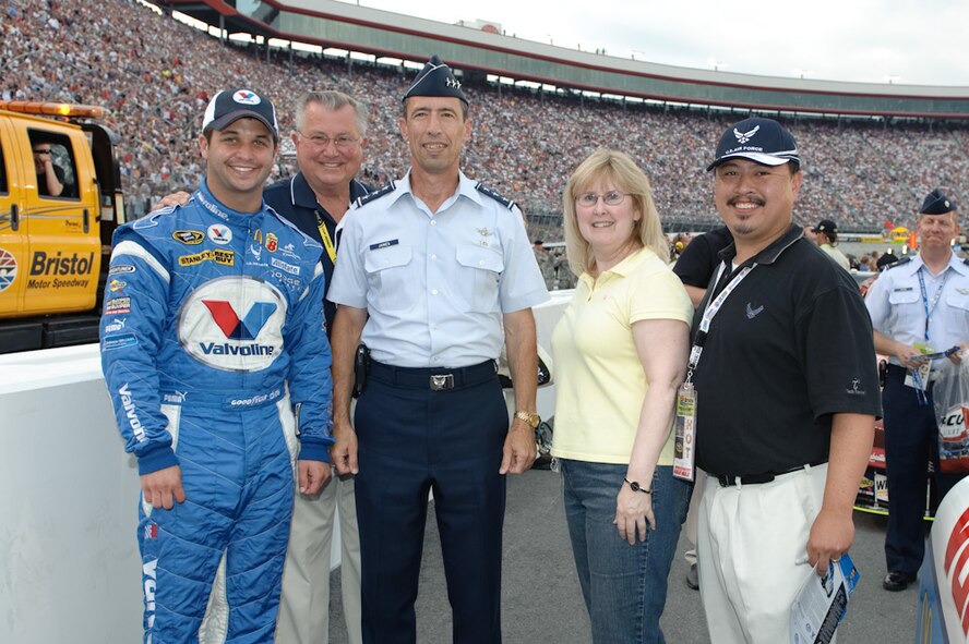 Pictured at Bristol Motor Speedway are, from left: Mr. Reed Sorenson, driver of the Air Force sponsored NASCAR racecar; John Thornton, co-owner of SPEAR Labs; Lt. Gen. Larry D. James, Commander, 14th Air Force (Air Forces Strategic), Air Force Space Command, and Commander, Joint Functional Component Command for Space, U.S. Strategic Command; Ms. Cynthia Gonsalves, Director, Office of the Secretary of Defense/Office of Technology Transition (OSD/OTT); and Mr. Augustine Vu, Air Force Small Business Innovation Research (SBIR) Program Manager. (Photo submitted)