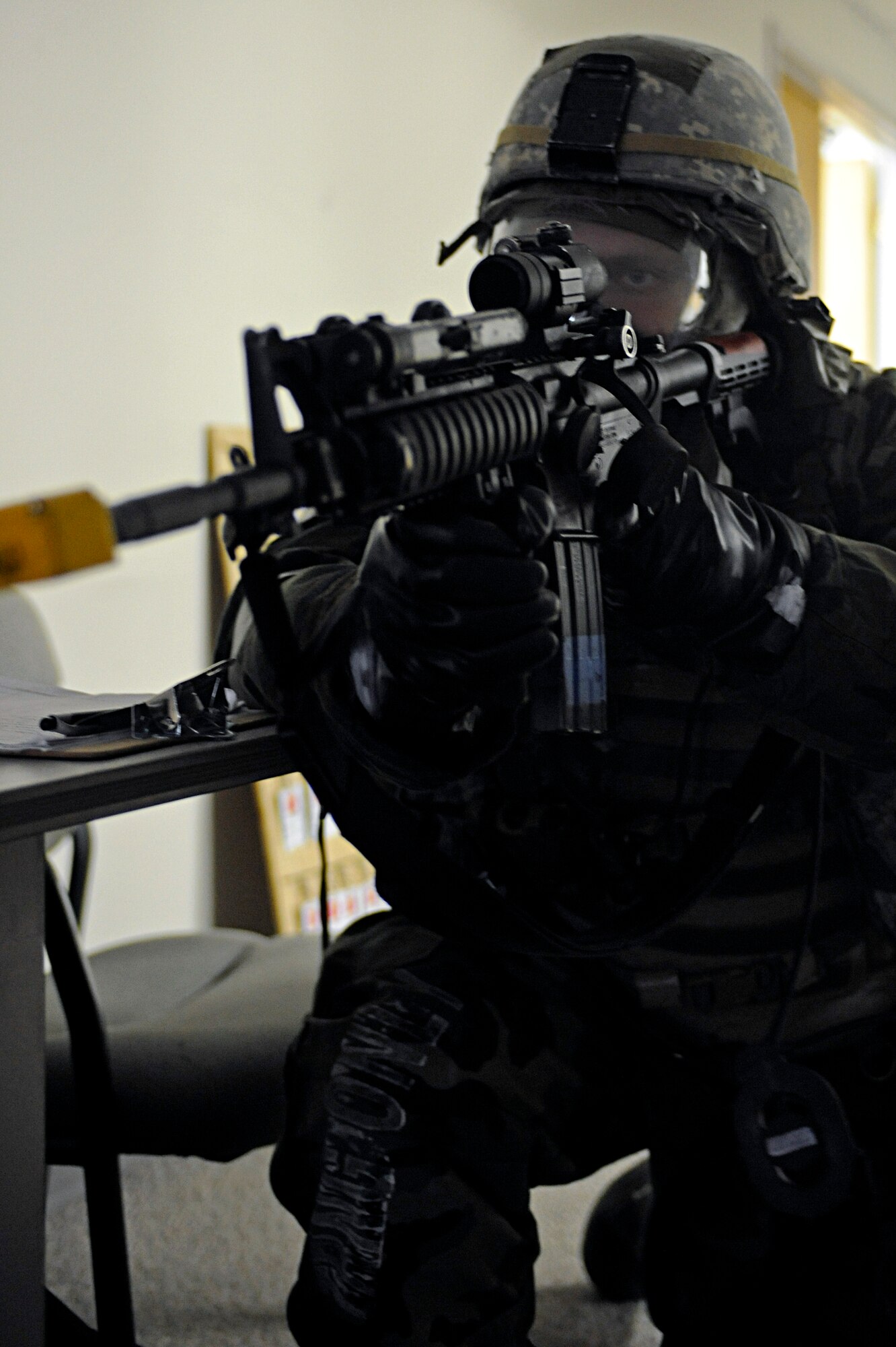 Senior Airman Isaac Bliek, 28th Security Forces Squadron patrolman, secures the area during an alarm at a Phase II Operational Readiness Exercise here, October 7. Operational Readiness Exercises provide vital training and prepare Airmen for worldwide deployment. (U.S. Air Force photo/Airman 1st Class Matthew Flynn)