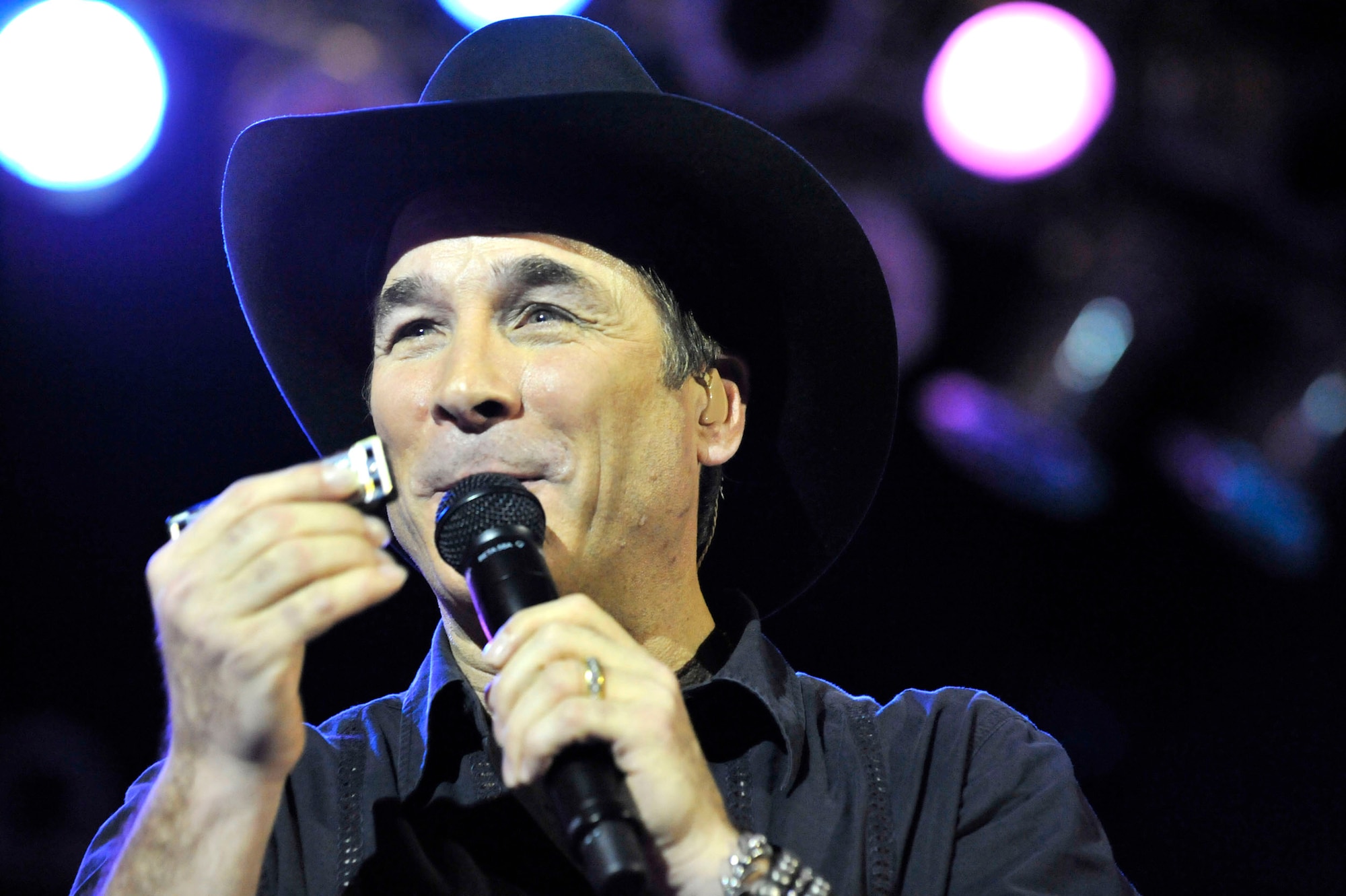 MINOT, N.D. -- Country singer Clint Black performs at North America’s largest Scandinavian festival called Norsk Hostfest here, Sept. 30.  Tens of thousands of people attend the event annually to celebrate and partake in the Scandinavian culture and entertainment with over 200 internationally recognized artisans.  (U.S. Air Force photo by Senior Airman Matthew Smith)