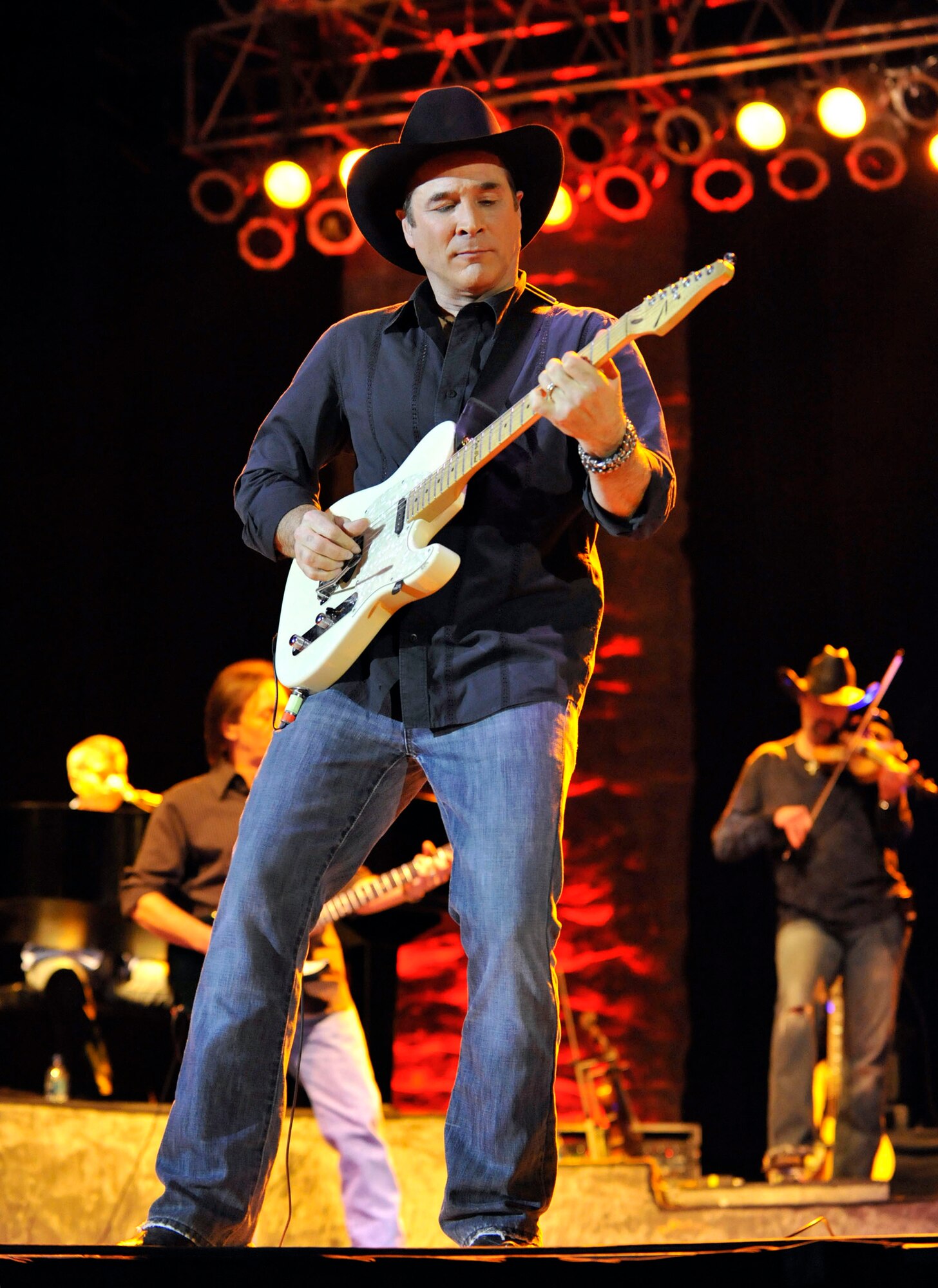 MINOT, N.D. -- Country singer Clint Black performs at North America’s largest Scandinavian festival called Norsk Hostfest here, Sept. 30.  Tens of thousands of people attend the event annually to celebrate and partake in the Scandinavian culture and entertainment with over 200 internationally recognized artisans.  (U.S. Air Force photo by Senior Airman Matthew Smith)