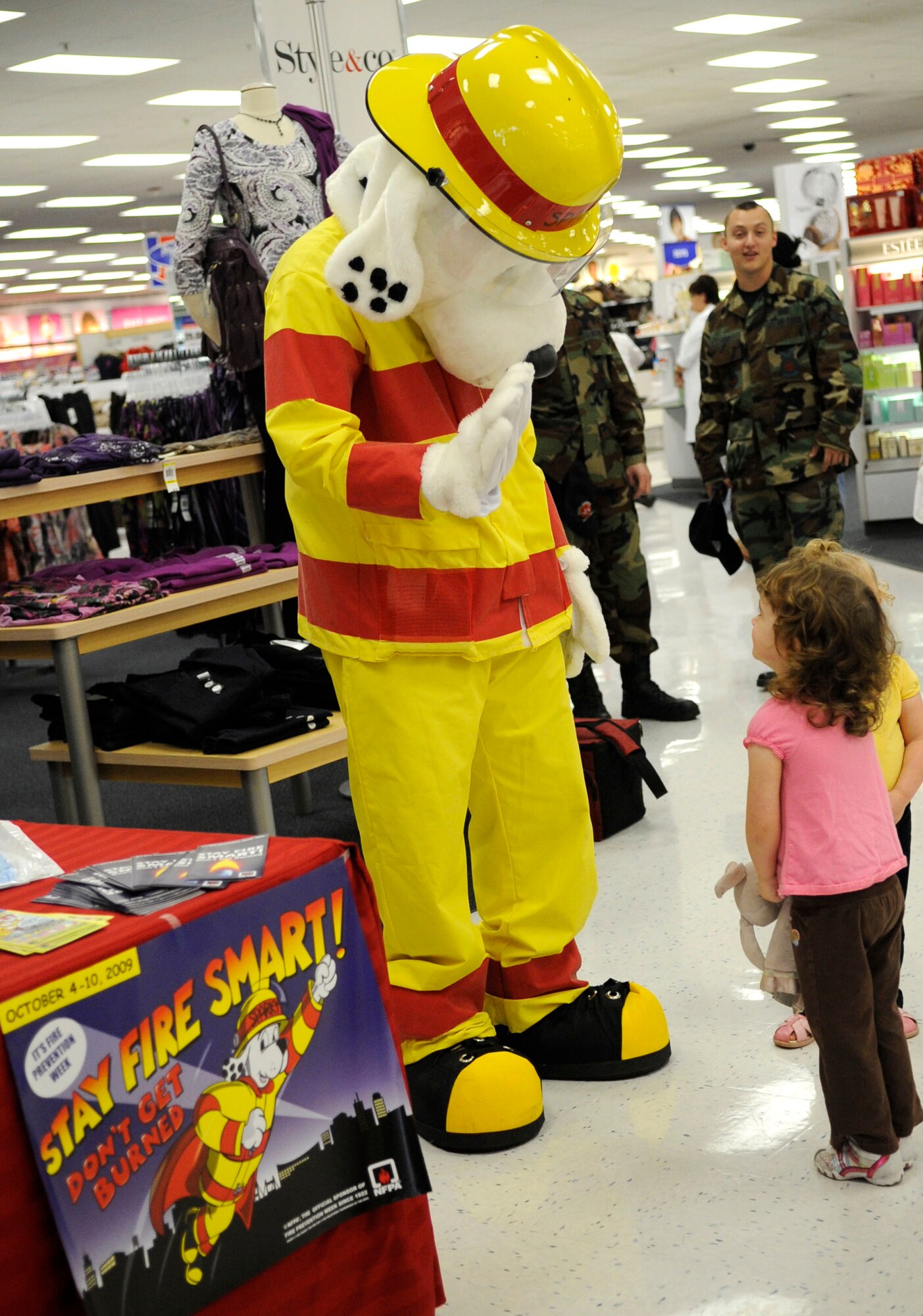 LANGLEY AIR FORCE BASE, Va - Sparky the fire dog talks to children about fire safety here Oct. 6. Sparky and base firefighters are teaching children about fire safety during Fire Prevention Week, Oct. 4-10. (U.S. Air Force photo/ Senior Airman Dana Hill)
