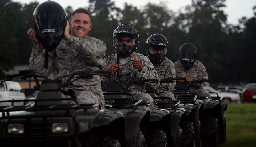 MOODY AIR FORCE BASE, Ga. -- Airmen wait for their next challenge during an all-terrain vehicle training course here Oct.  5. Upon course completion and certification, participants will be qualified as ATV operators. (U.S. Air Force photo by Airman 1st Class Joshua Green)