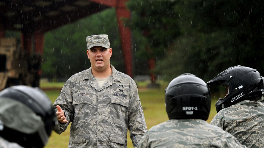 MOODY AIR FORCE BASE, Ga. -- Staff Sgt. Michael Betts, 824th Security Forces Squadron emergency manager, briefs Airmen on their next scenario during an all-terrain vehicle training course here Oct. 5. Training during the course consisted of cone weaving, speed control and driving over certain obstacles. (U.S. Air Force photo by Airman 1st Class Joshua Green)