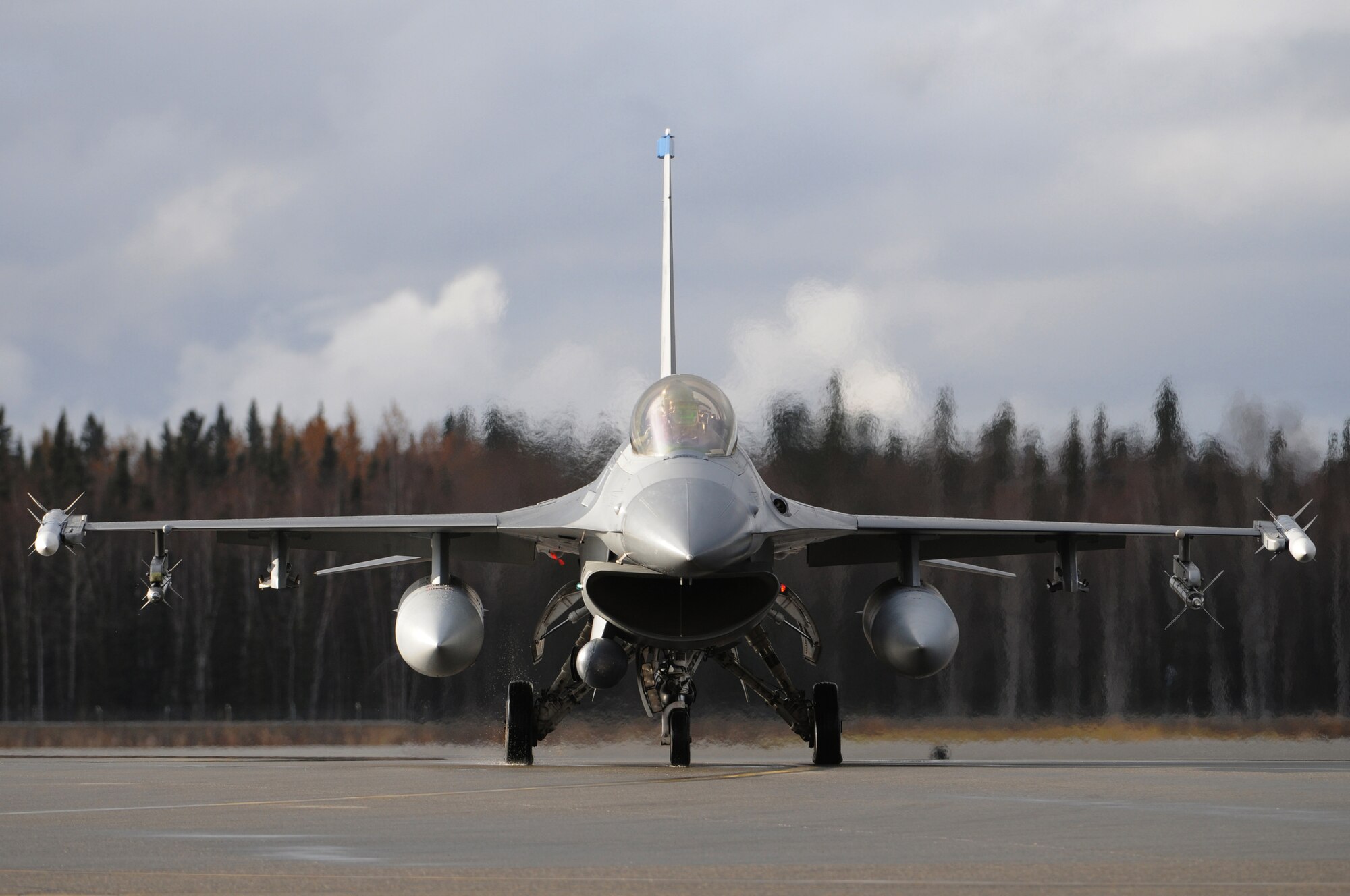 An F-16 Fighting Falcon from Kunsan Air Base, Republic of Korea, taxis to the runway during RED FLAG-Alaska 10-1 Oct. 6, 2009, Eielson Air Force Base, Alaska. RF-A is a Pacific Air Forces-directed field training exercise poised at giving aircrews their first 10 flights in simulated air combat conditions. (U.S. Air Force photo/Staff Sgt. Christopher Boitz)