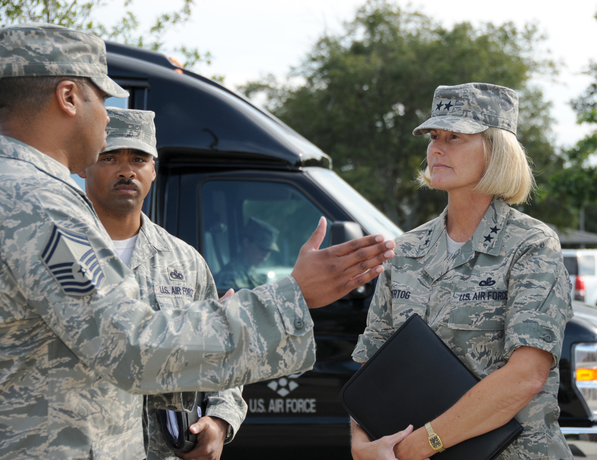 From left, Senior Master Sgt. William Hawkins, 338th Training Squadron, gives Chief Master Sgt. Linus Jordan,  2nd Air Force’s new command chief, and General Hertog an overview of the squadron’s air expeditionary force training area in the Triangle.  The new 2nd Air Force leaders were given an orientation tour of Keesler Sept. 29-30.  (U.S. Air Force photo by Kemberly Groue)