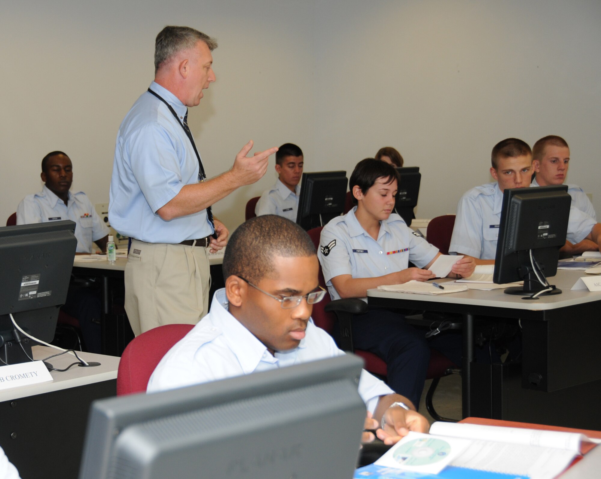 Michael Gainey, instructor supervisor in the 332nd Training Squadron, speaks to enlisted students in the new cyber initial skills courses that began Monday in Dolan Hall.  In the coming year, another 18 cyber courses will be launched at Keesler, culminating in the new officer and enlisted cyber warfare courses in October 2010.  The new courses replace 13 existing communications courses.  Kee-sler’s cyber training program impacts two training wings, four training squadrons and one detachment.  To date, $6 million has been spent on the training development effort. (U.S. Air Force photo by Kemberly Groue)