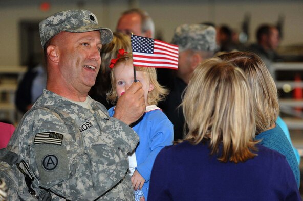 SHAW AIR FORCE BASE, S.C. -- Lieutenant Col. James Lander, 4th Battlefield Coordination Detachment, greets family and friends after arriving here after a 12- month deployment Oct. 5. The 4th BCD has been supporting air and ground operations in the U.S. Central Command Area of Responsibility. (U.S. Air Force photo/ Senior Airman Matt Davis)