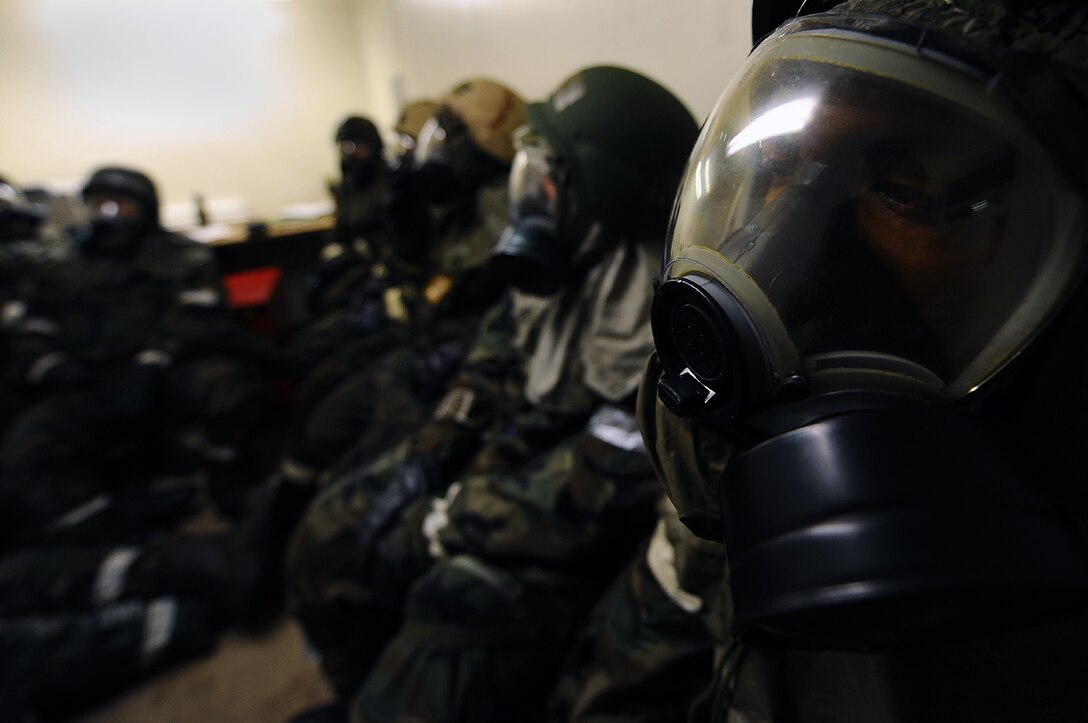 Airman 1st Class James Bodison, 28th Aircraft Maintenance Squadron aerospace propulsion apprentice, sits in a bunker for safety with other Airman during a Phase II Operational Readiness Exercise here, October 6.  The exercise is designed to test Airmen’s knowledge about what to do in a deployed combat situation. (U.S. Air Force photo/Airman 1st Class Joshua J. Seybert) 
