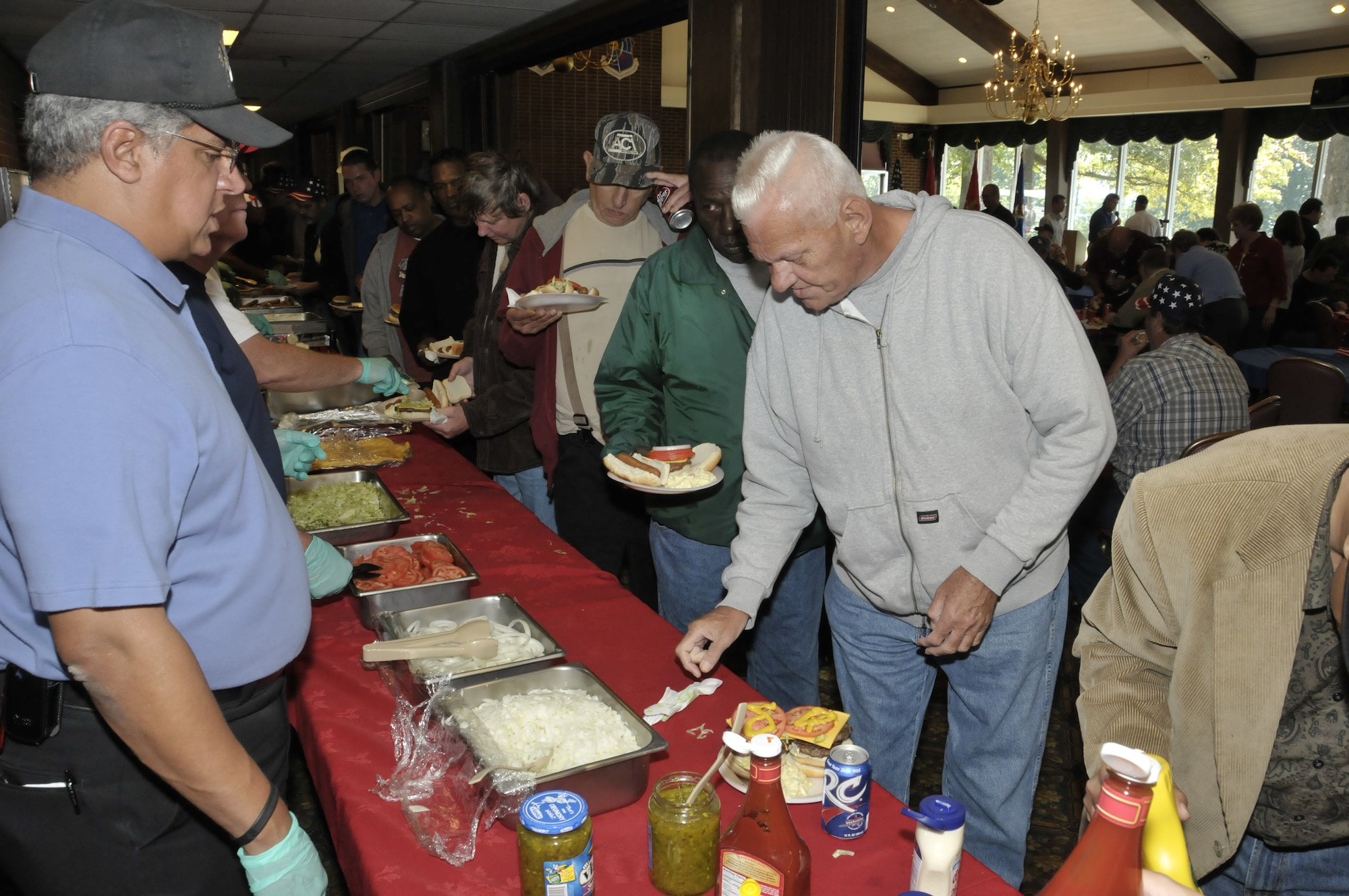 Arnold Engineering Development Center Fire Department Chief Daryle Lopes serves food to veterans at Arnold’s annual VA Picnic Oct. 1. (Photo by Rick Goodfriend)
