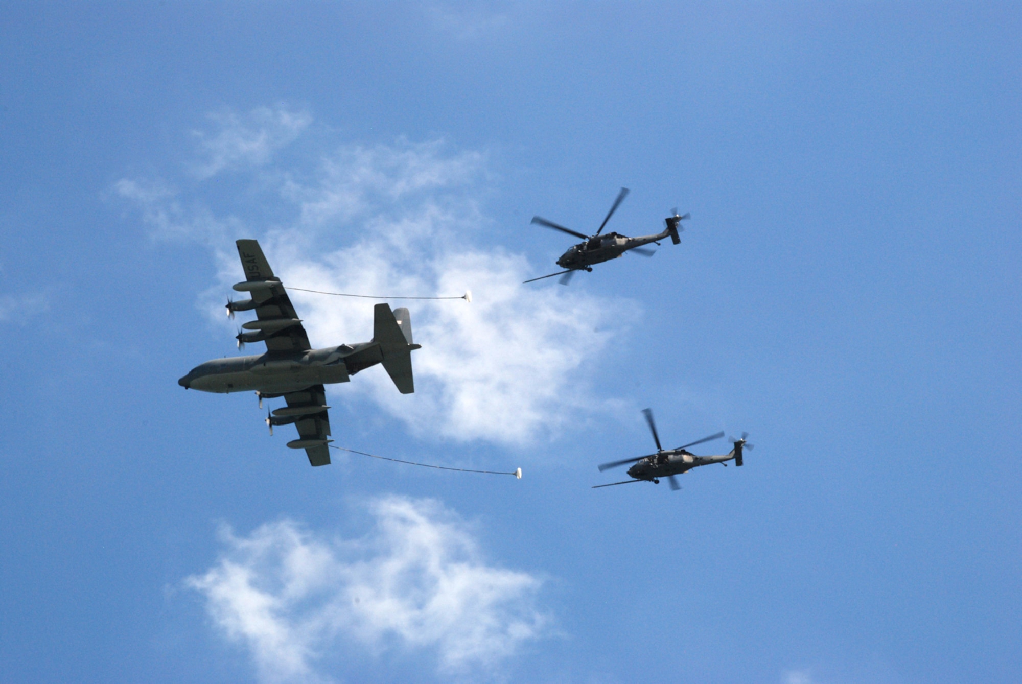 PATRICK AIR FORCE BASE, Fla. – An HH-60 Pave Hawk from the 920th Rescue Wing here, shows off its superior pilots, crew and agility during an air-to-air refueling demonstration during the Cocoa Beach Air Show Oct. 2-4, 2009. The 920th Rescue Wing is always looking for good people who want to be a part of the nation’s premier Combat Search & Rescue Wing – We need support in a variety of capacities. Stop by your local recruiter for more information. (Courtesy photo by/Robert Scott)