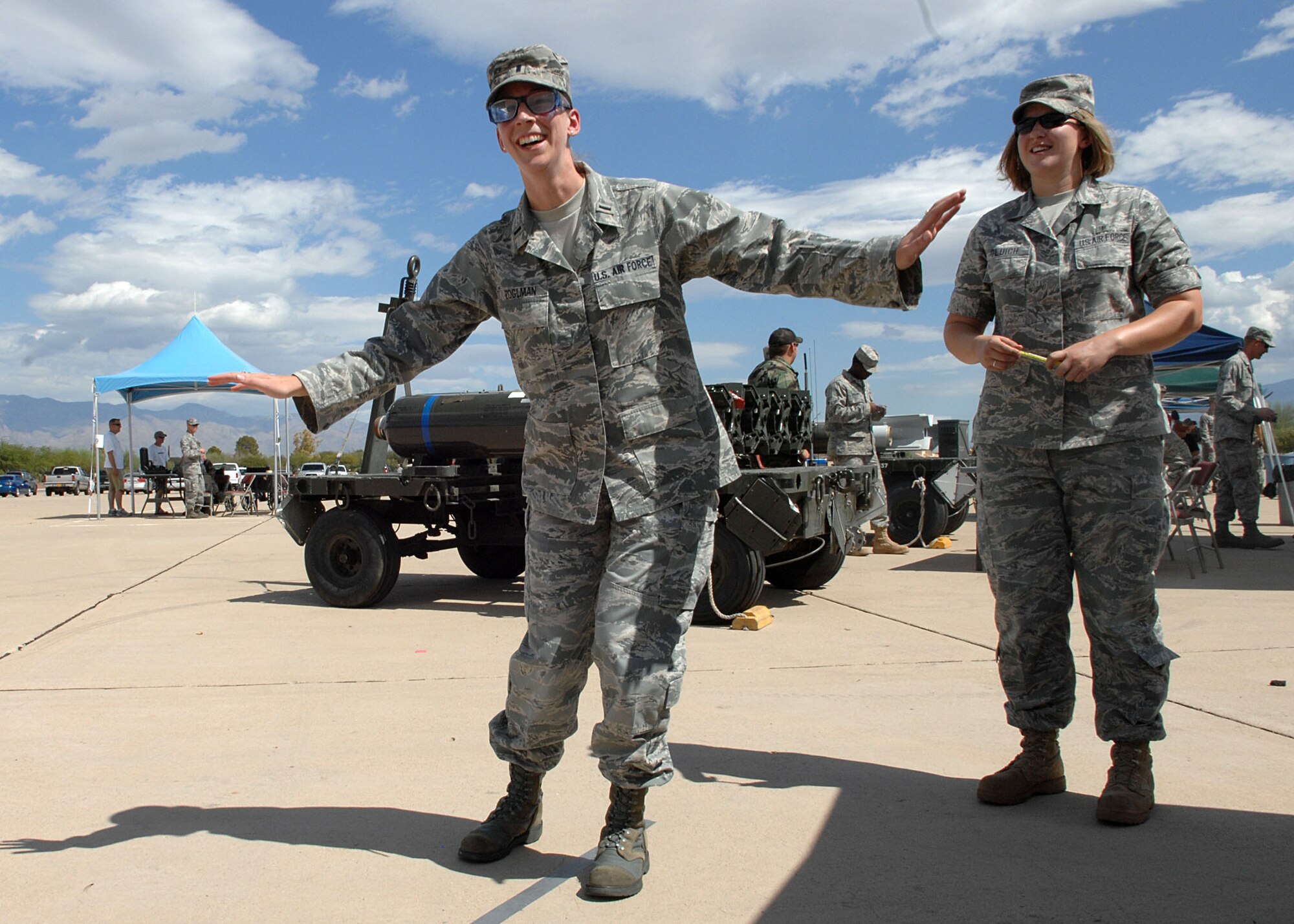 1st Lt. Elithe Zoglman, 355th Communication Squadron, attempts to walk a straight line during Safety Day at Heritage Park Sept. 30. Lieutenant Zoglman wore “beer” goggles which simulate a person’s vision after reaching a blood-alcohol level of .18. (U.S. Air Force photo/Airman Jerilyn Quintanilla)