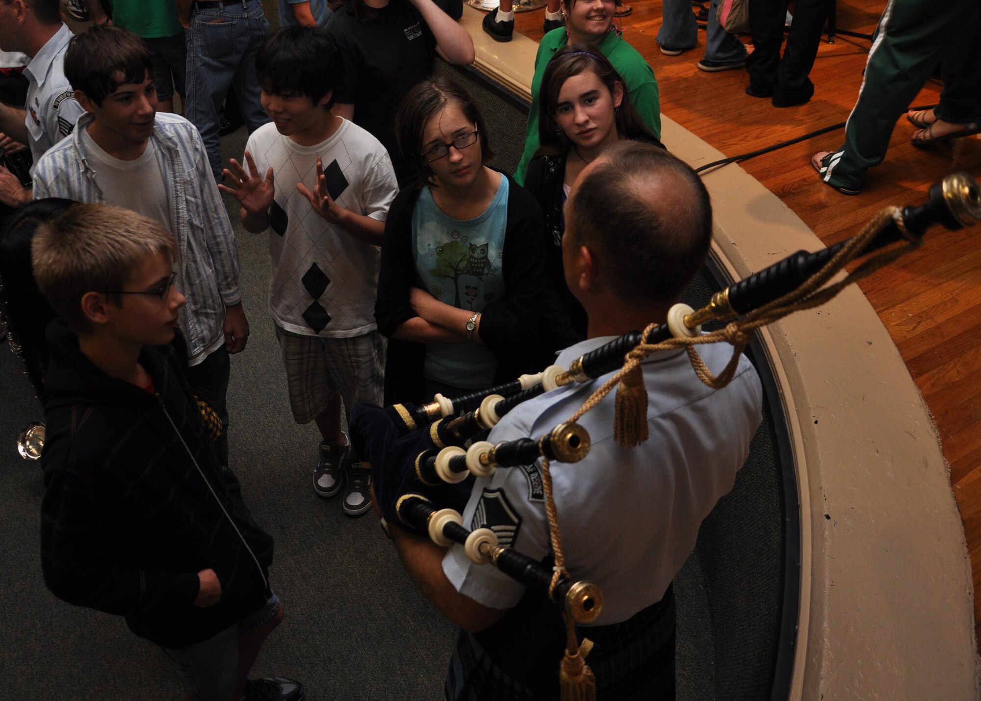 After the concert, students came up to talk to an Air Force Reserve member about the various instruments, show off their own talent and pick up a few pointers Oct. 2 at the Choctawhatchee High School auditorium in Fort Walton Beach.  (U.S. Air Force photo/Staff Sgt. Bryan Franks)