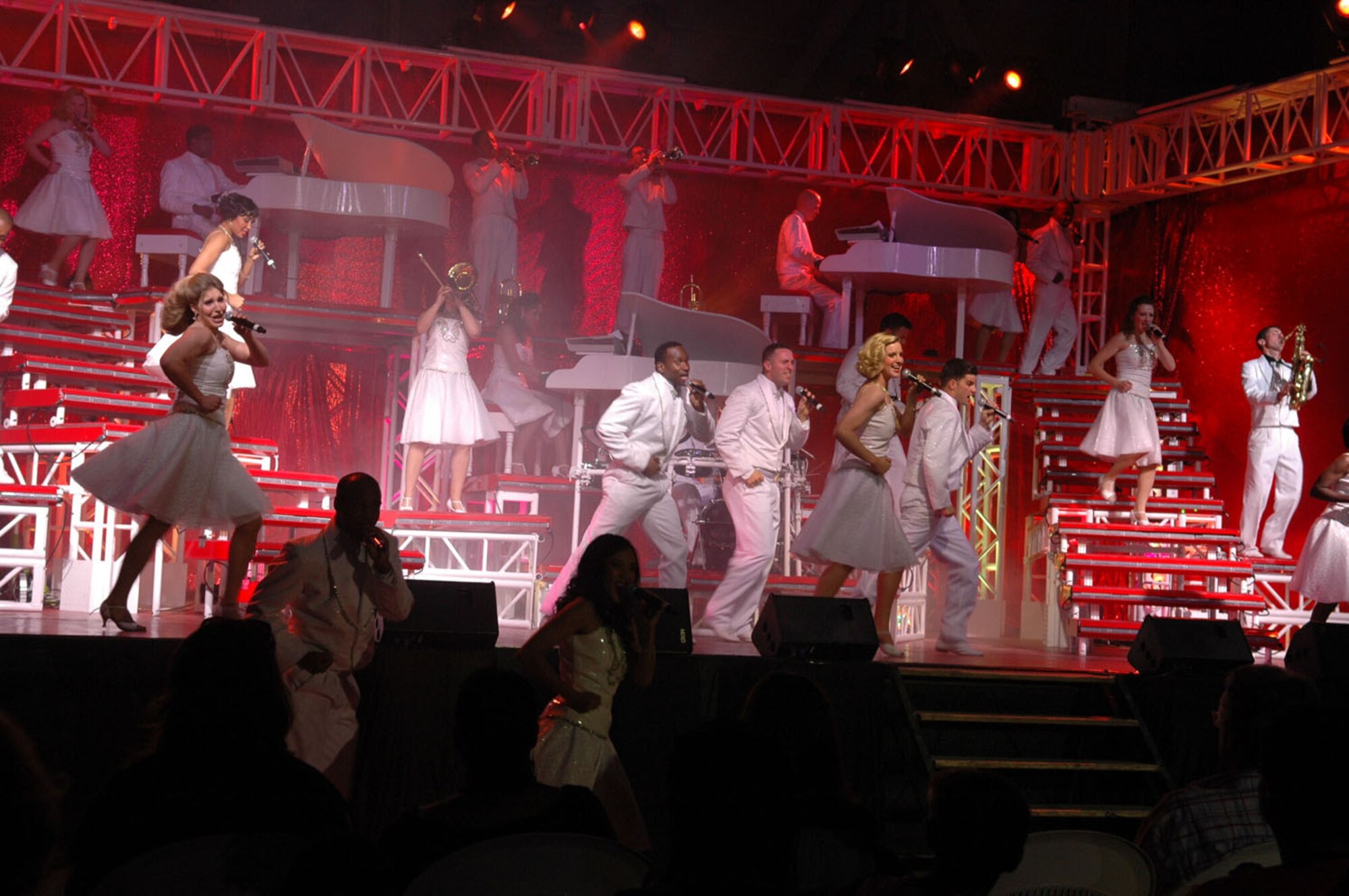 Members of the Tops in Blue perform at Aviano Air Base, Italy on Oct. 3, 2009. Tops in Blue serves as an expeditionary entertainment unit. Its focus is on the Air Force family with priority to Air Force personnel stationed worldwide at remote and deployed locations. (U.S. Air Force photo/Staff Sgt. Mercedes Crossland)