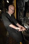 MINOT AIR FORCE BASE, N.D. – Airman 1st Class Tommy Yost, 5th Logistics Readiness Squadron all-purpose vehicle maintenance apprentice, replaces a hydraulic line on an Oshkosh Sweeper, here. Oct. 6. Airman Yost is doing routine maintenance in preparation for the upcoming winter weather. (U.S. Air Force photo by Senior Airman Matthew Smith)