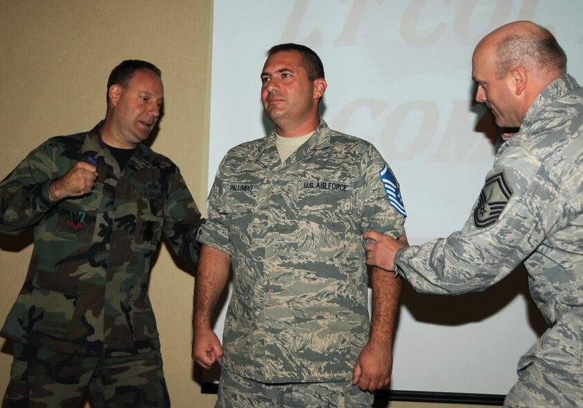 Newly promoted Master Sgt. Kevin Palumbo, 28th Aircraft Maintenance Squadron power generation distribution and environmental systems specialist, receives Stripes for Exceptional Performers here, Sep. 29. STEP is a program designed to recognize top performers in the enlisted ranks of E-5 through E-9. (U.S. Air Force photo/Airman 1st Class Anthony Sanchelli)