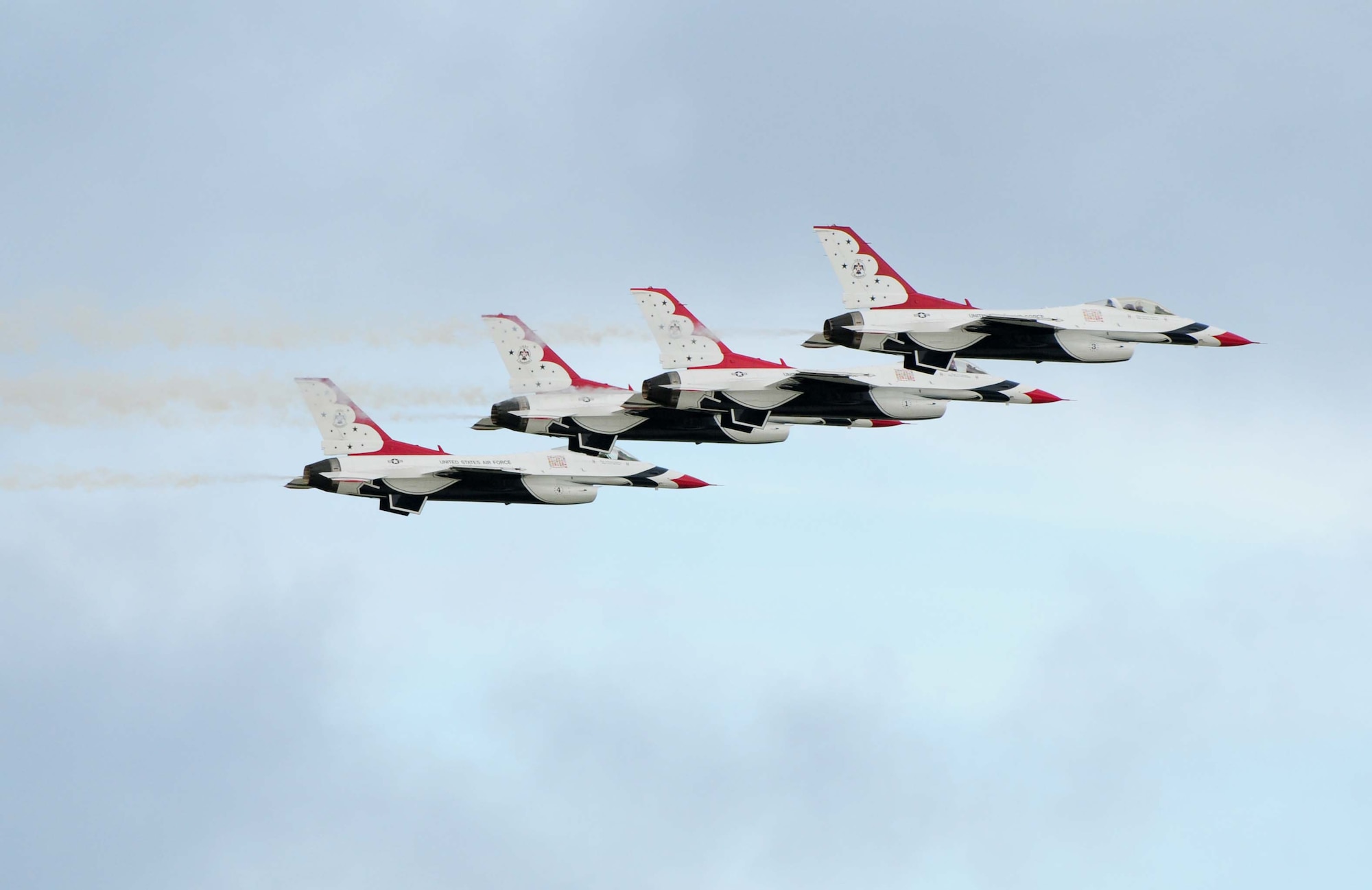 ANDERSEN AIR FORCE BASE, Guam - Thunderbird F-16's fly in Diamond Formation over Andersen AFB, Guam, Oct. 7. The U.S. Air Force Thunderbirds is the premier aerial demonstration team representing Airmen worldwide. (U.S. Air Force photo by Airman 1st Class Julian North)