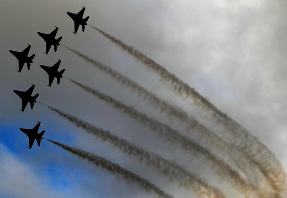 ANDERSEN AIR FORCE BASE, Guam – The U.S. Air Force Thunderbirds world renown Delta Formation flies by the audience attending the Team Andersen Air Show '09 "Airpower over the Marianas" here on Andersen Air Force Base, Guam, Oct. 7. The U.S. Air Force's aerial demonstration team, the Thunderbirds, were one of four aerial demonstration teams to perform for the audience.  (U.S. Air Force photo by Senior Airman Christopher Bush)