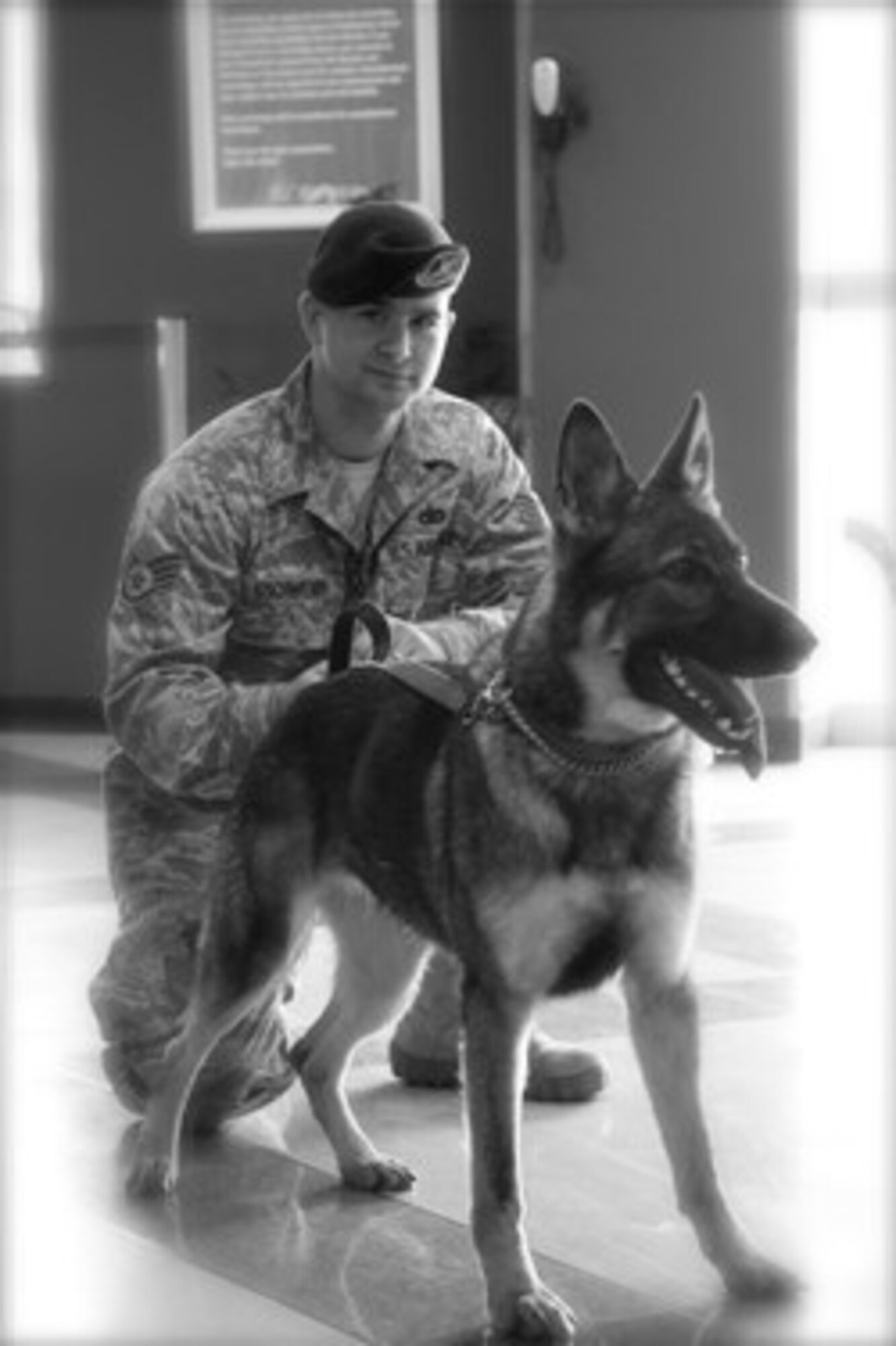 YOKOTA AIR BASE, Japan -- Staff Sgt. Sanford Gschwend, 374th Security Forces Squadron military working dog handler, and Pixi, a 3-year-old German Shepherd. (Courtesy photo)