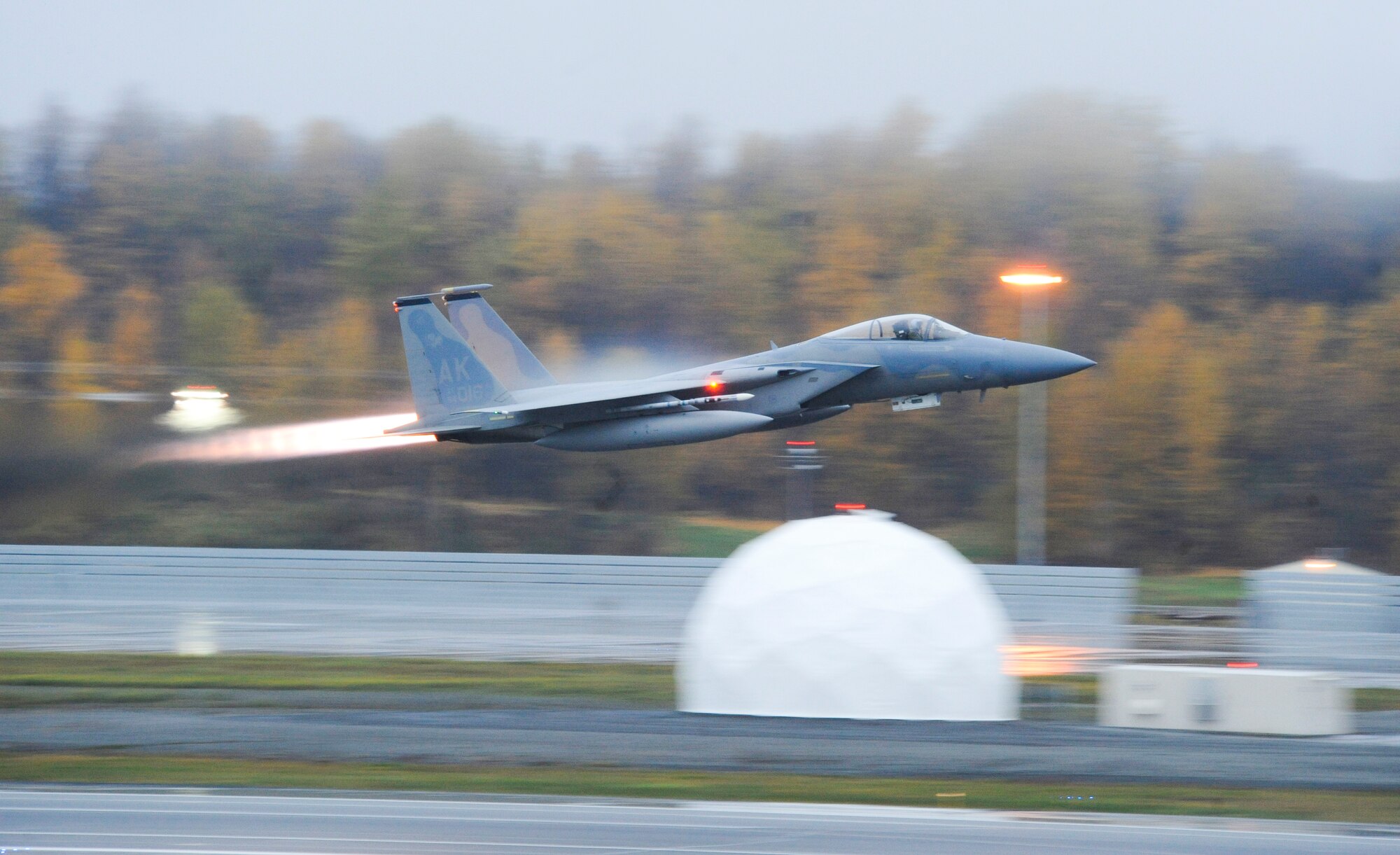 ELMENDORF AIR FORCE BASE, Alaska?An F-15 Eagle from the 19th fighter squadron takes off in afterburner during Red Flag Alaska 10-1, Oct. 8. Red Flag is a Pacific Air Forces commander-based field training exercise for U.S. coalition forces flown under simulated air combat conditions. It provides joint offensive counter-air, interdiction close air support, and large force employment training in a simulated combat environment. (U.S. Air Force photo/Senior Airman Matt Coleman-Foster)