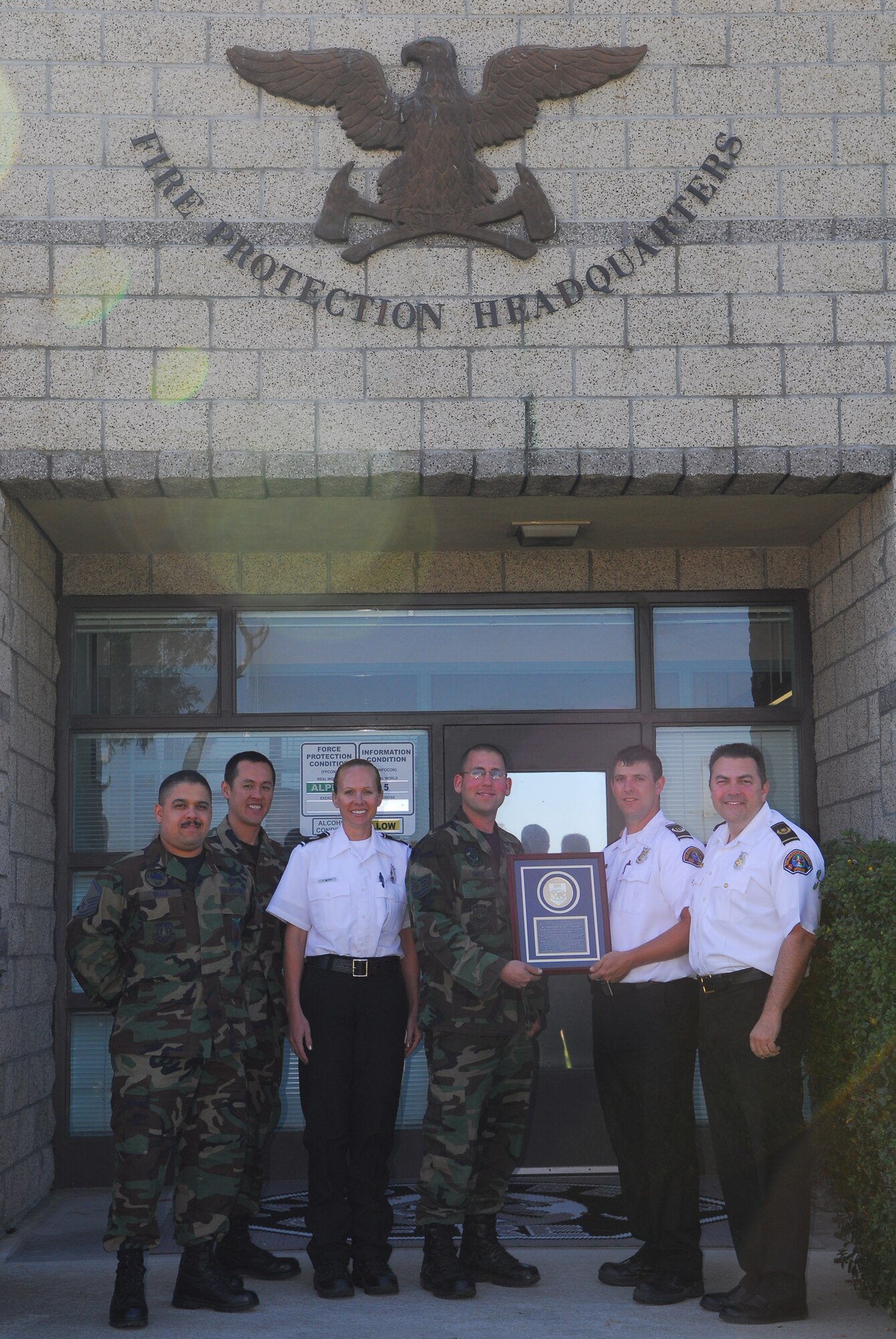 VANDENBERG AIR FORCE BASE, Calif. – Vandenberg Fire was a recent recipient of the renowned Commission on Fire Accreditation International. Less than 100 fire departments world-wide have been recognized with this accreditation. Pictured from Vandenberg Fire, from left to right, is Master Sgt. Juan Valle, Senior Master Sgt. Joe Orona,Traci Betty, Tech. Sgt. Garrick Hasty, Scott Balatgek and Mark Farias.(U.S. Air Force photo/Airman 1st Class Steve Bauer)