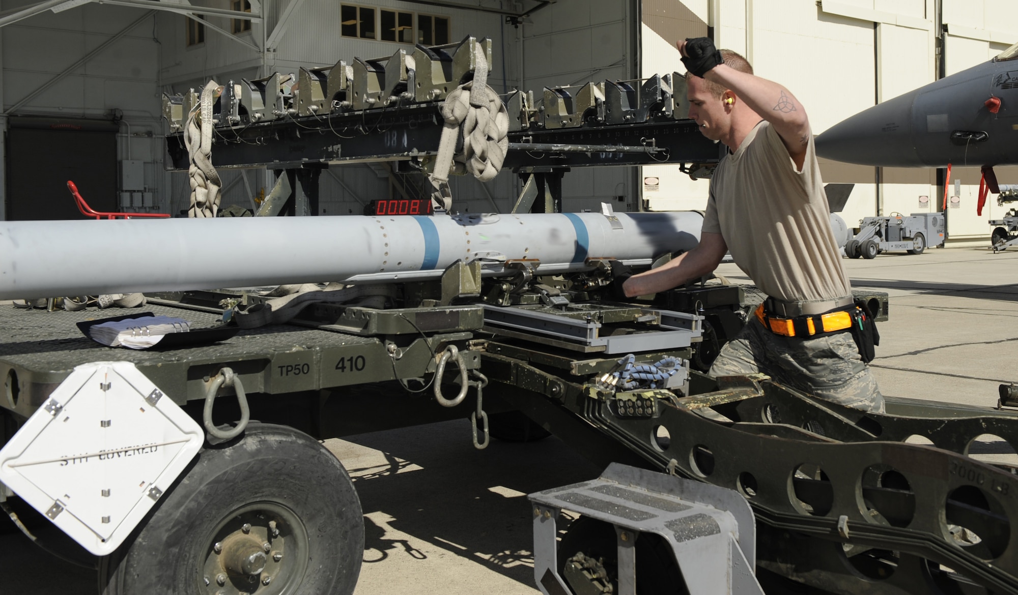 MOUNTAIN HOME AIR FORCE BASE, Idaho -- Staff Sgt. David Foster, 391st Aircraft Maintenance Unit weapons load crew member, performs a final inspection on the AIM-9LM sidewinder during the Weapons Load Crew Competition Oct. 2. The 428th Fighter Squadron took its first victory winning the competition by only one point. (U.S. Air Force photo by Airman 1st Class Renishia Richardson)