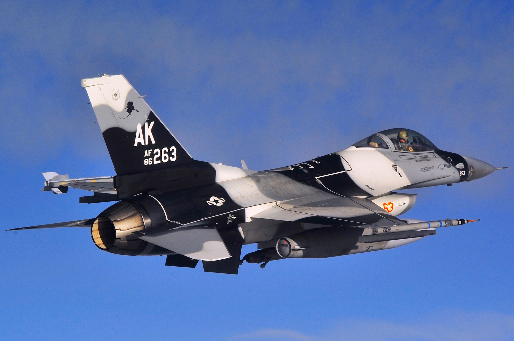 An F-16 Fighting Falcon Aggressor flies over the Joint Pacific Alaska Range Complex during RED FLAG-Alaska 10-1 Oct. 8, 2009, Eielson Air Force Base, Alaska. RF-A is a Pacific Air Forces-directed field training exercise poised at giving aircrews their first 10 flights in simulated air combat conditions. (U.S. Air Force photo/Staff Sgt. Christopher Boitz)