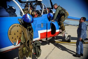 Lieutenant General Mark D. "Shack" Shackelford climbs into the Dassault/Dornier Alpha Jet belonging to the Patrouille Acrobatique de France ("French Acrobatic Patrol") for an incentive flight.  General Shackelford is the military deputy, Office of the Assistant Secretary of the Air Force for Acquisition at the Pentagon. The general was an experimental test pilot in the F-16, the first Air Force pilot to fly the YF-22 Advanced Tactical Fighter prototype, managed the F-22 Cockpit Development Program and directed the T-38, F-5, F-16 and F-22 programs. (U.S. Air Force photo by Senior Airman Steven R. Doty)